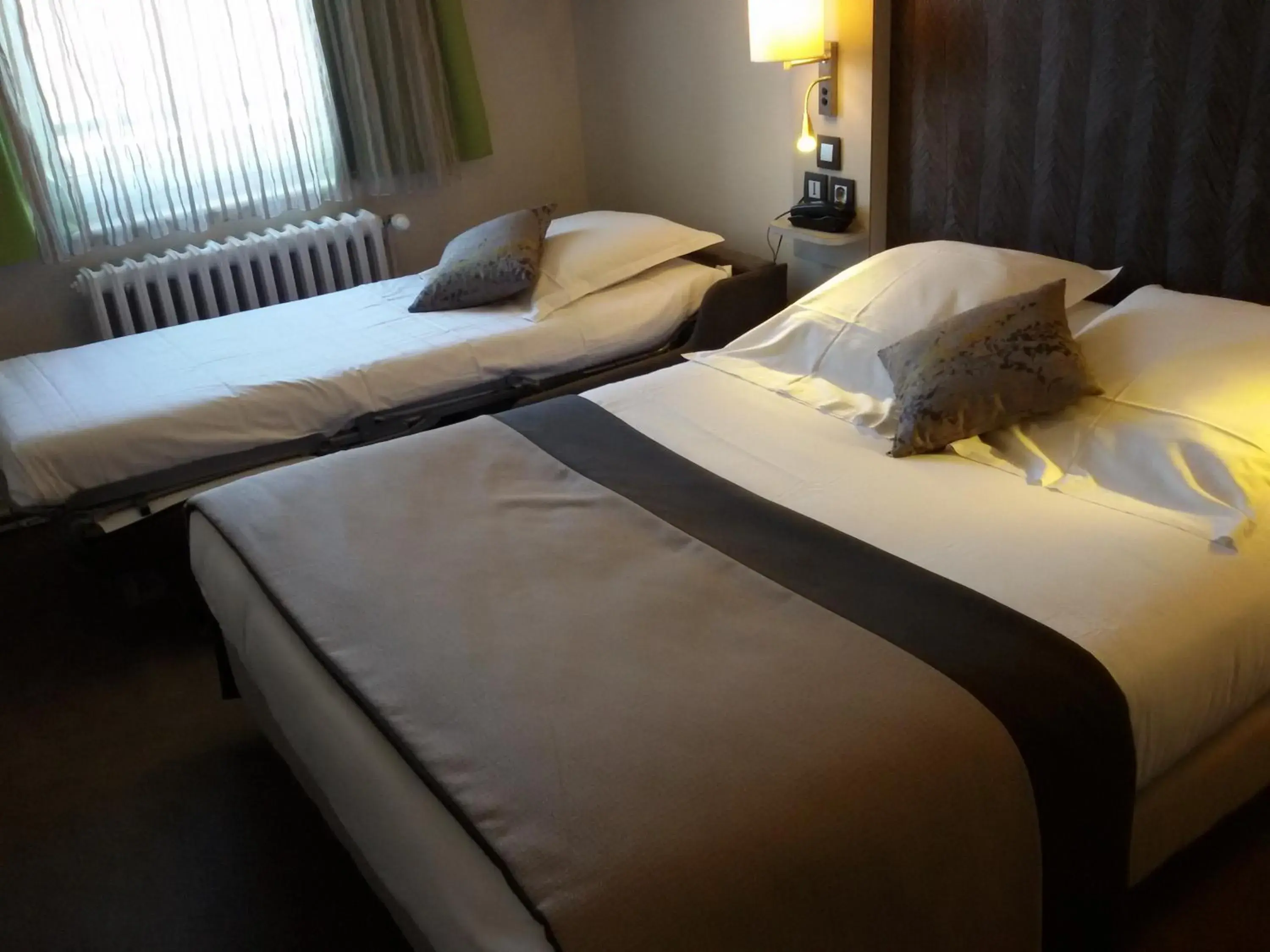 Double Bed Room and 1 single sofa in Hotel Albert Elisabeth Gare SNCF