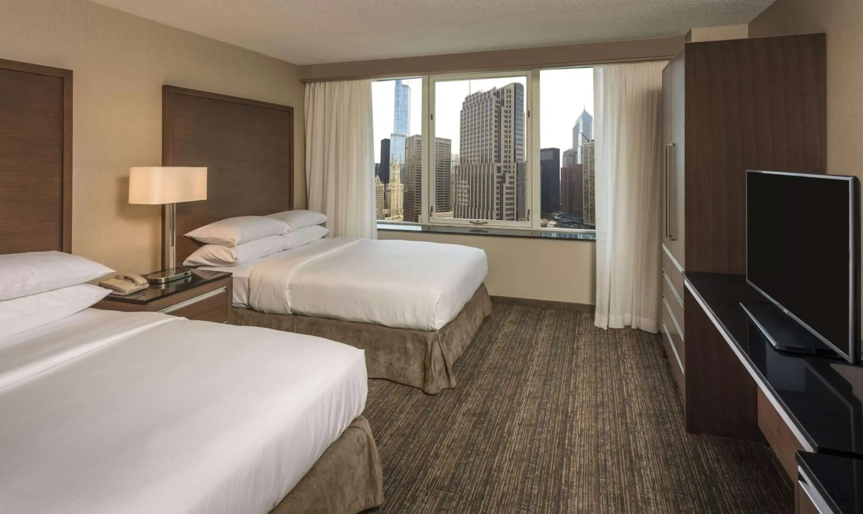 Bed in Embassy Suites by Hilton Chicago Downtown Magnificent Mile
