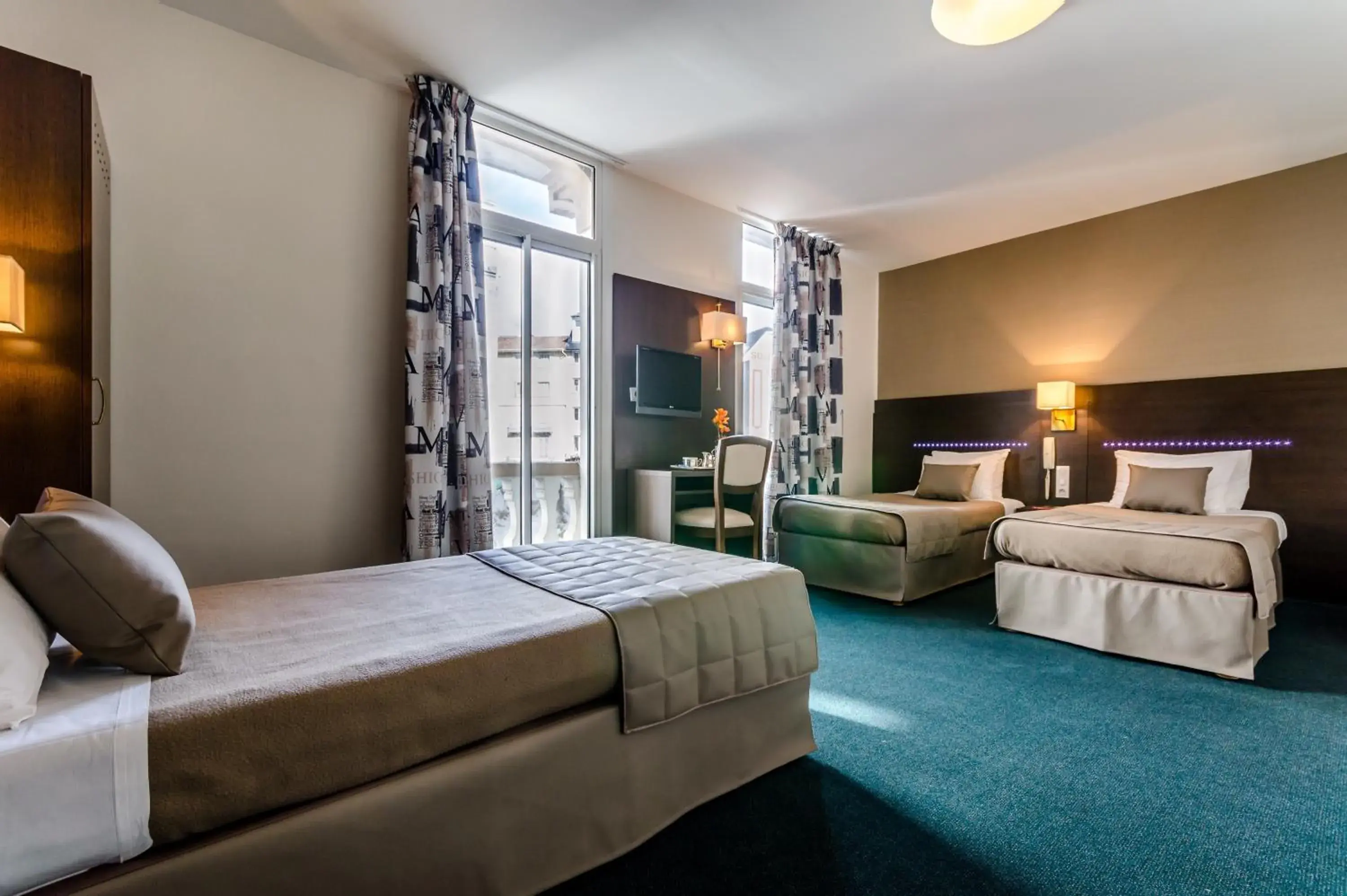 Bedroom in Hôtel Croix des Bretons - Lourdes Pyrénées Bedroom in Hôtel Croix des Bretons - Lourdes Pyrénées