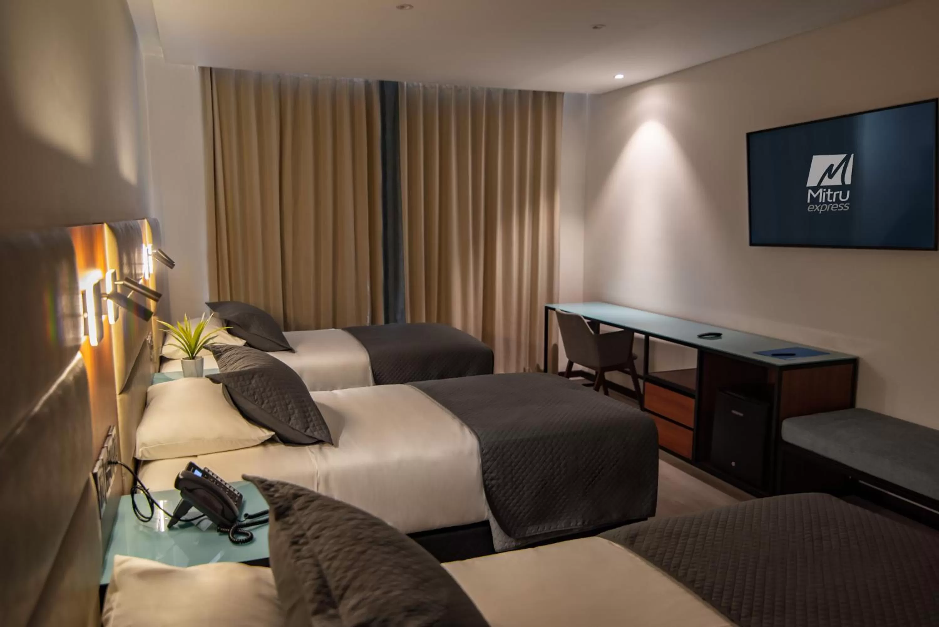 Bed in Mitru Express Hotel