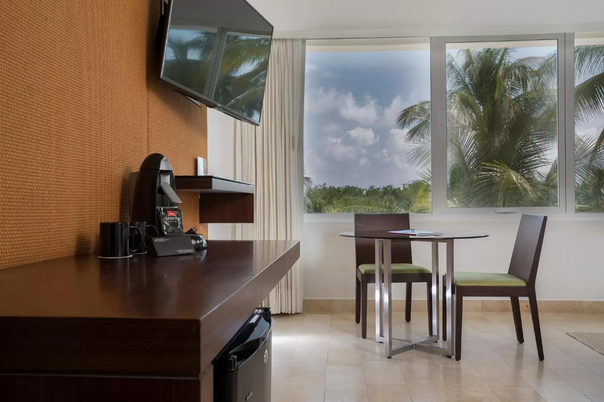 Photo of the whole room, TV/Entertainment Center in InterContinental Presidente Cancun Resort