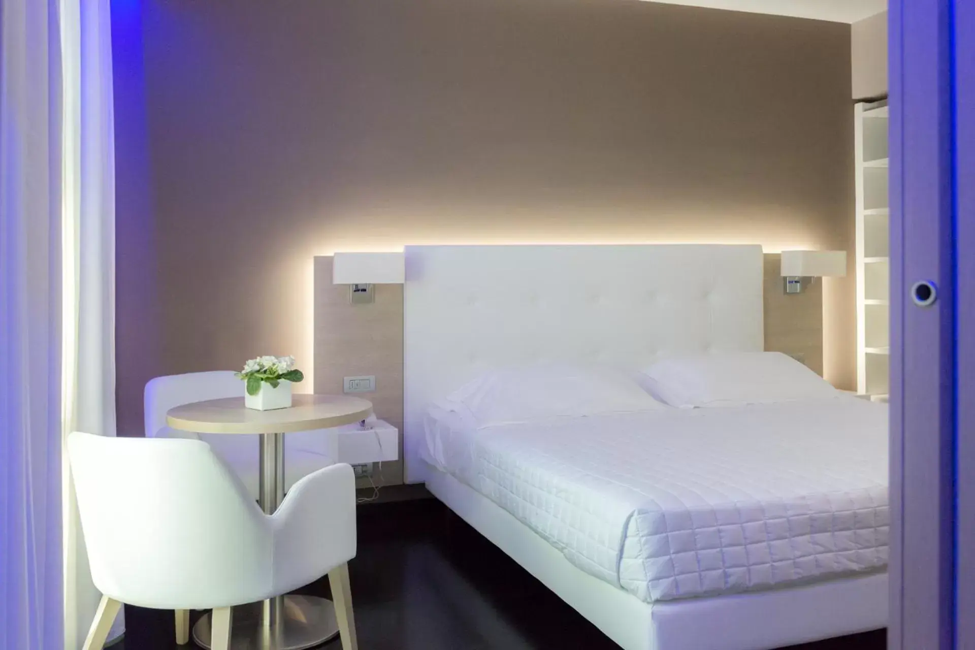 Bed in Raffaello Hotel