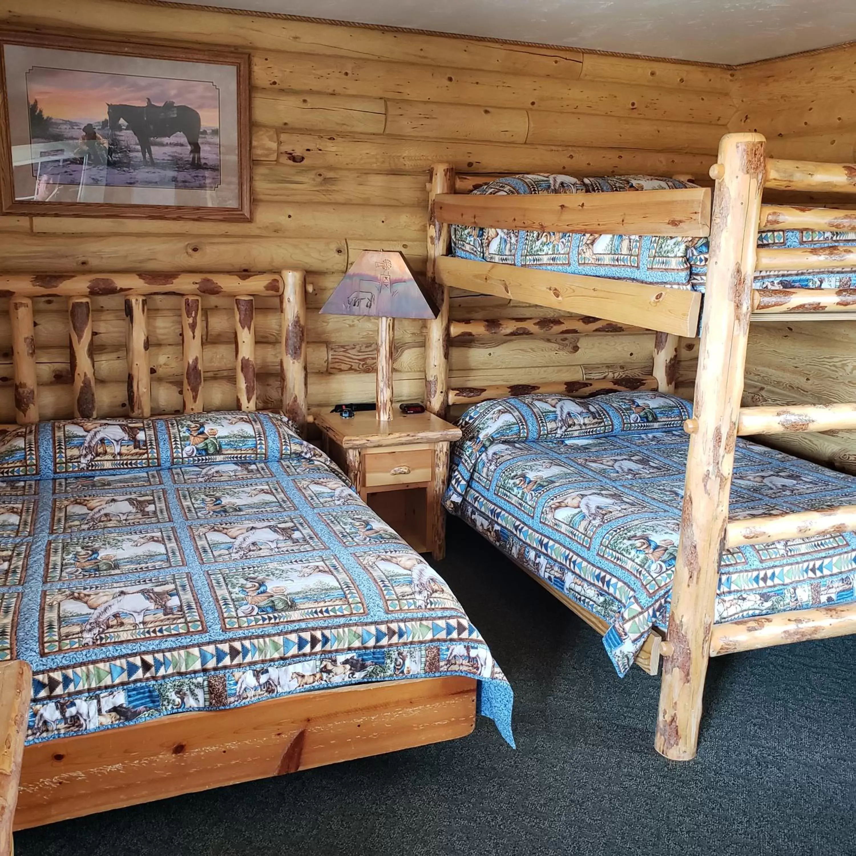 Bed, Bunk Bed in Wolf Den Log Cabin Motel and RV Park