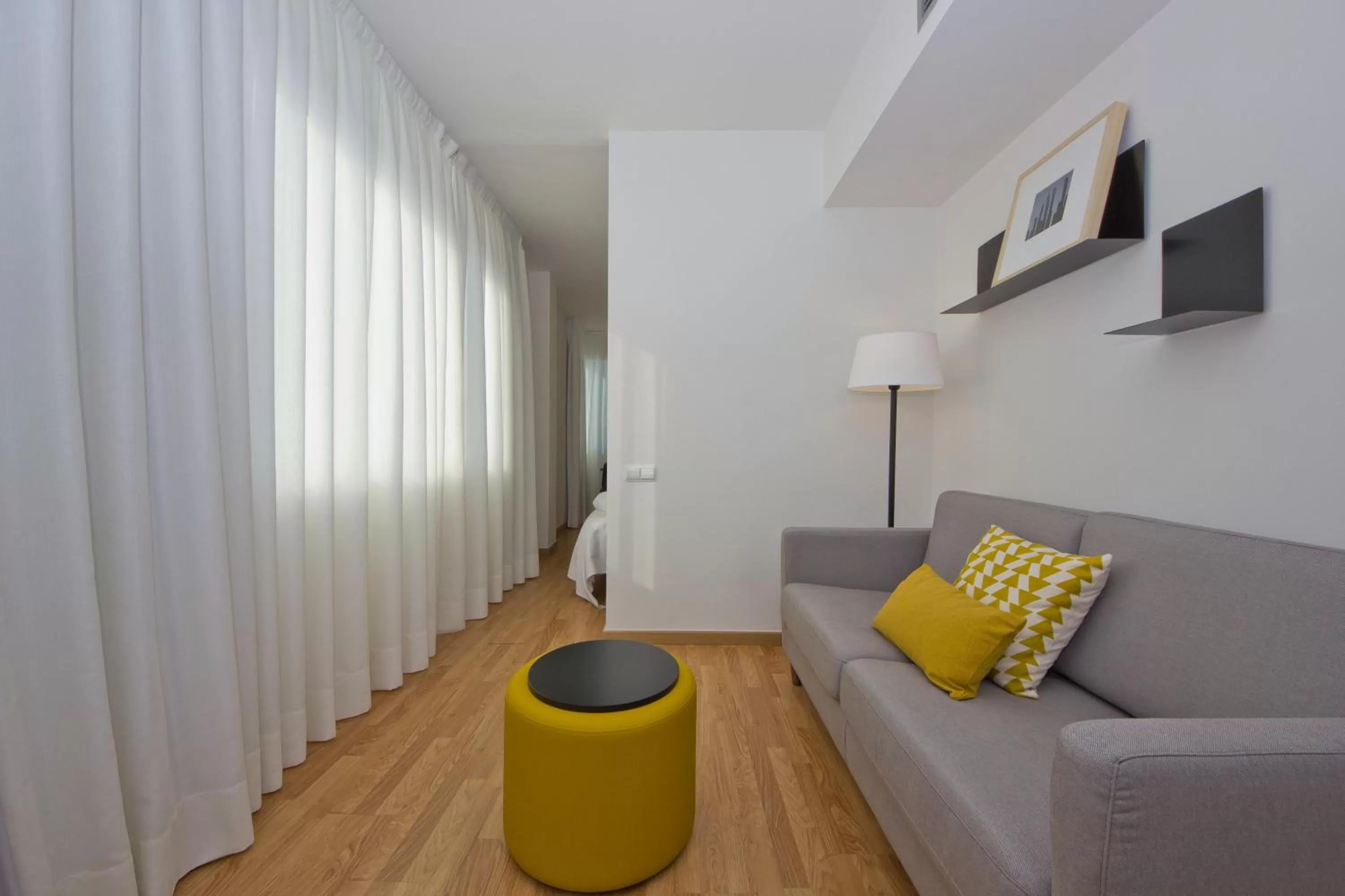 Seating area in Aparthotel Atenea Valles