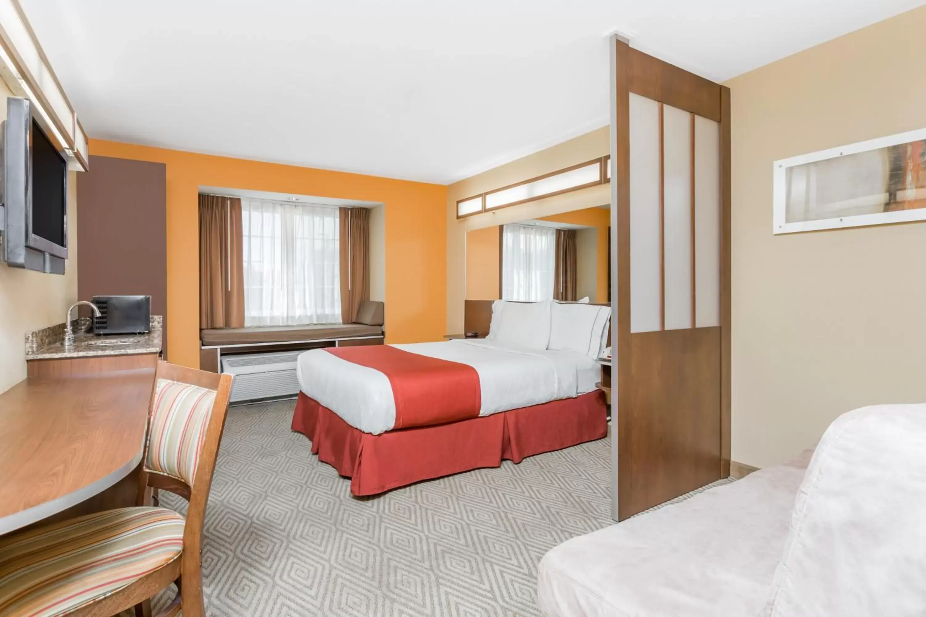 Bed in Microtel Inn and Suites by Wyndham Anderson SC