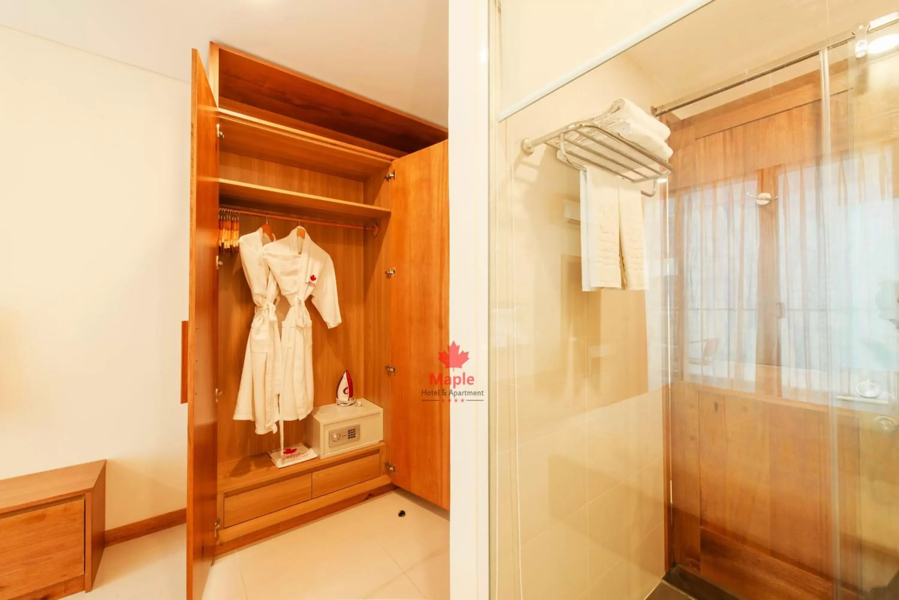 wardrobe, Bathroom in Maple Hotel & Apartment