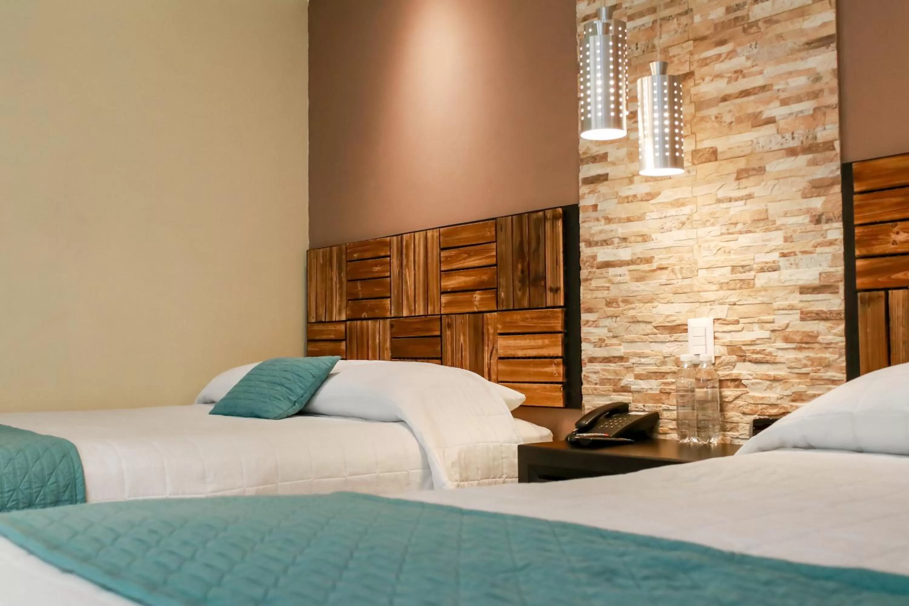 Bed in Las Magnolias Hotel Boutique