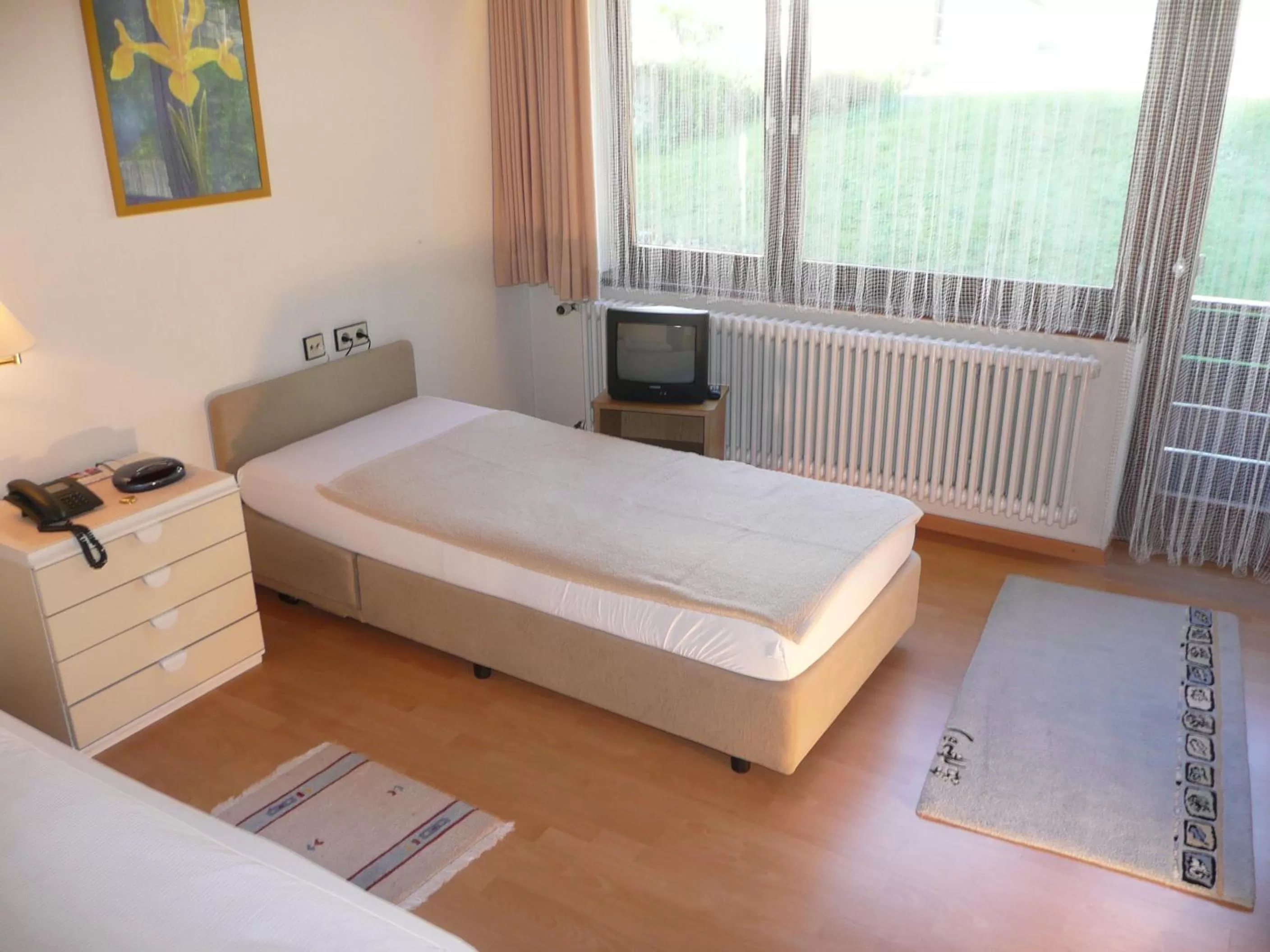 Photo of the whole room, Bed in Hotel Tannenhof