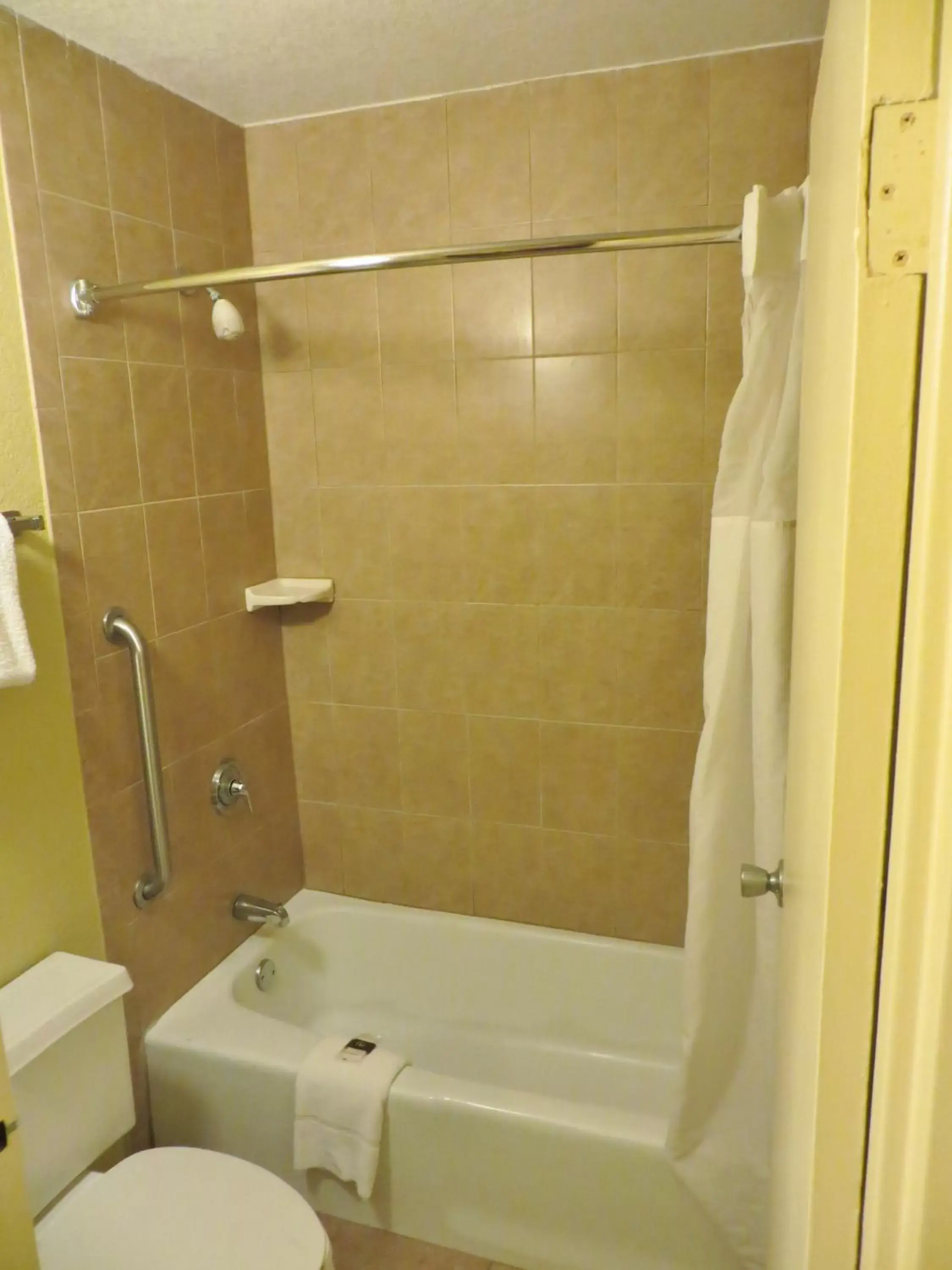 Bathroom in Days Inn by Wyndham Orlando Airport Florida Mall