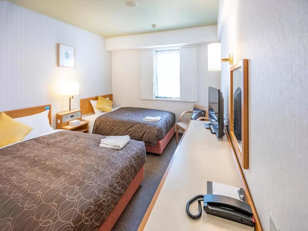 Photo of the whole room, Bed in Nishitetsu Inn Tenjin