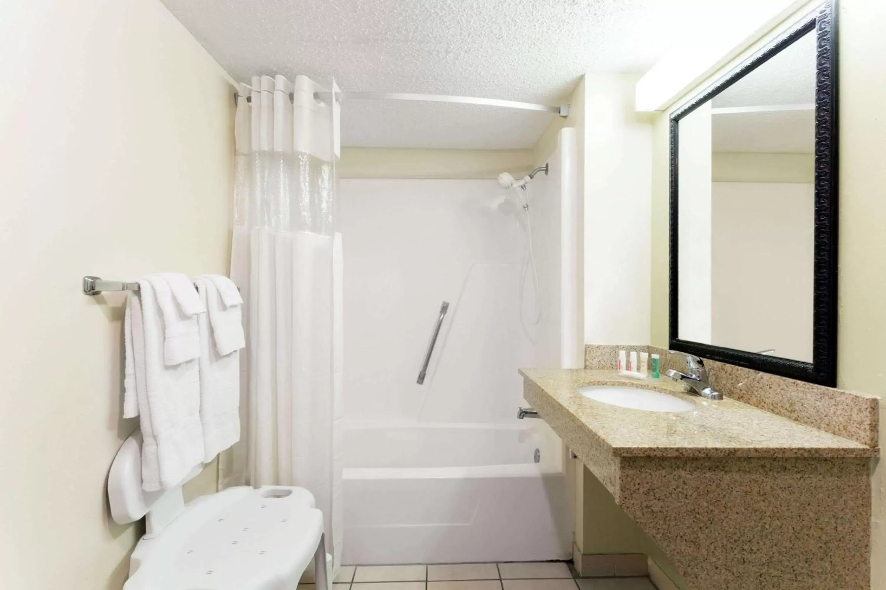 Bathroom in Howard Johnson by Wyndham Tallahassee