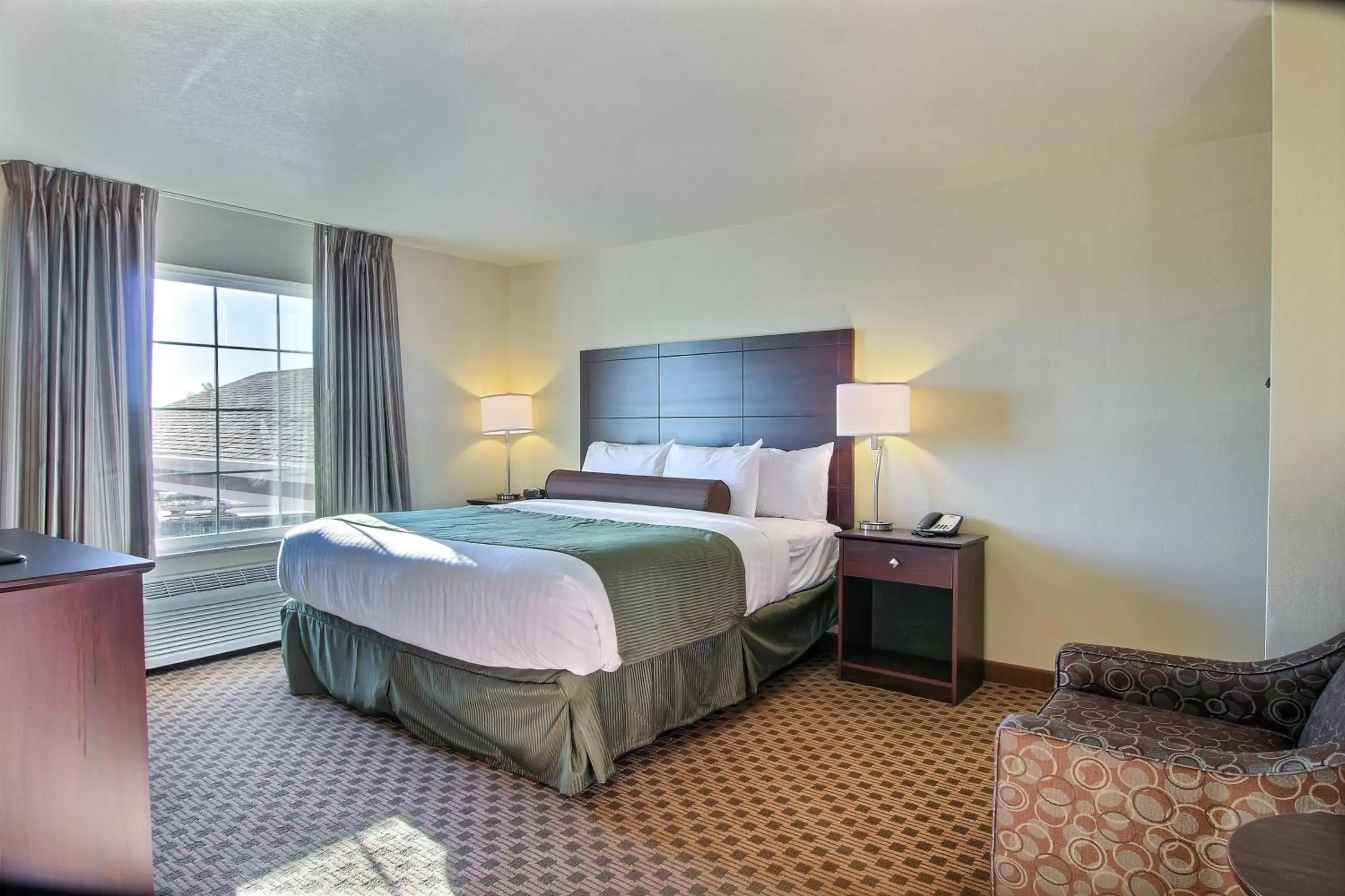 Bed in Cobblestone Hotel & Suites - McCook