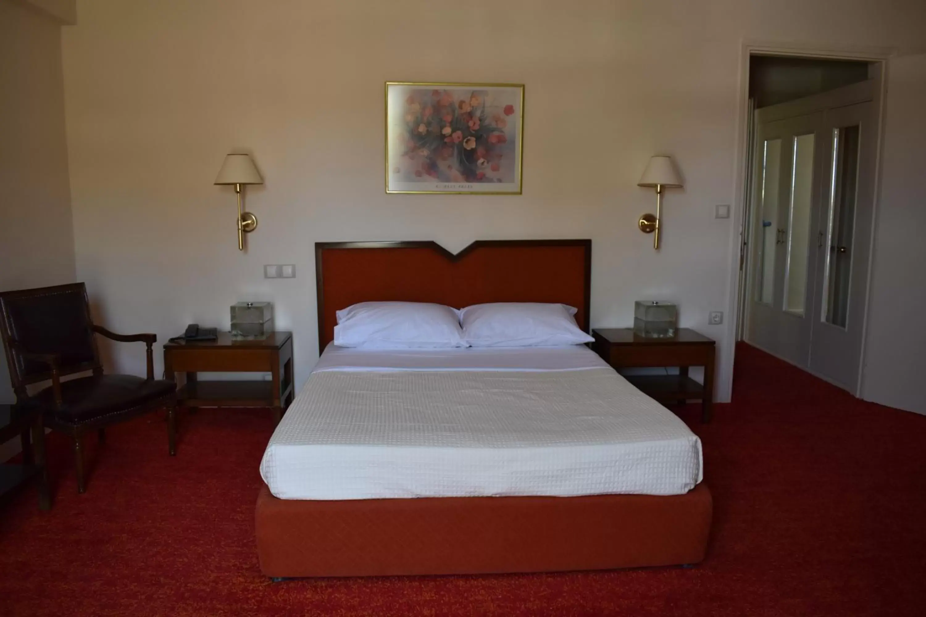 Bed in Hotel Theoxenia