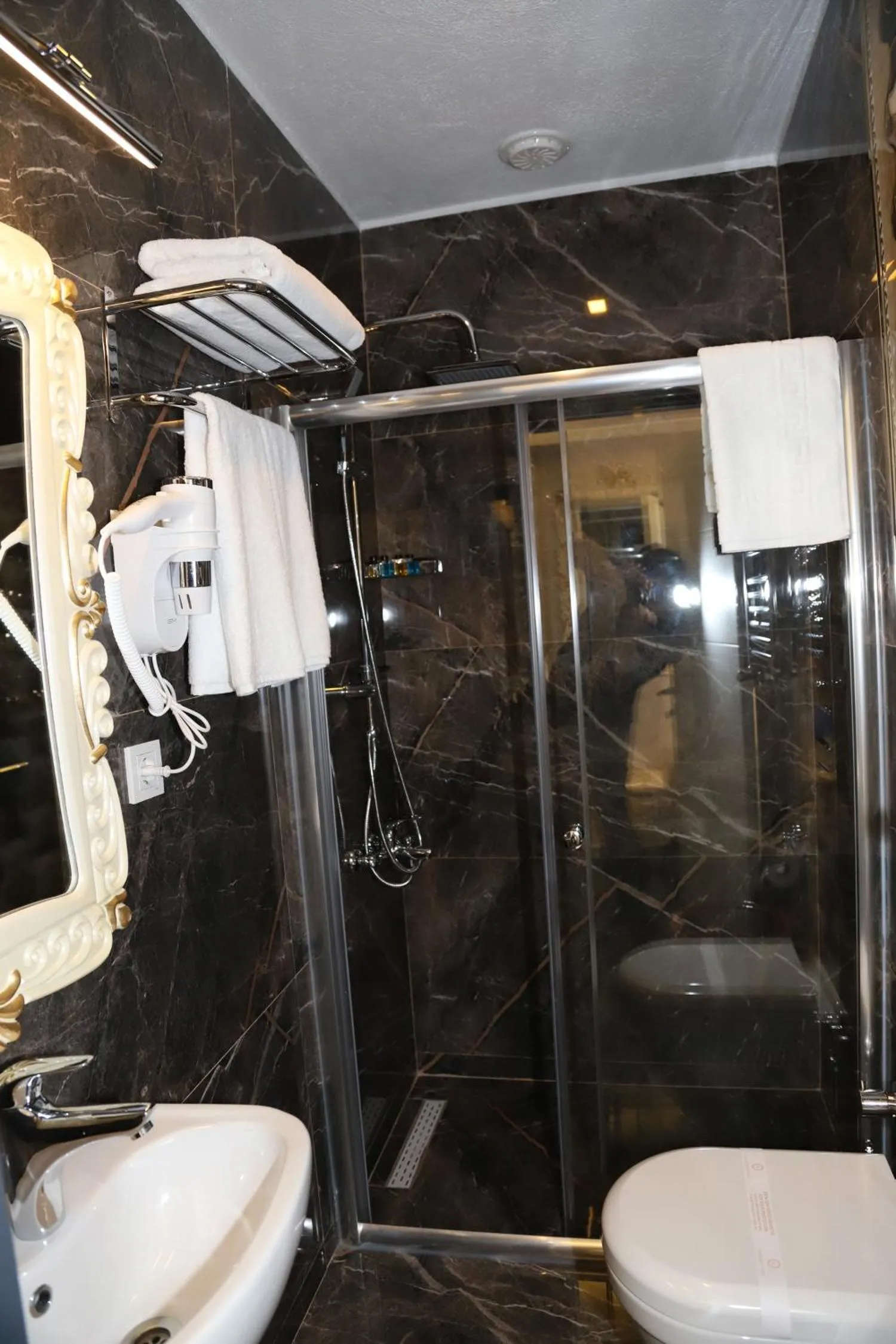 Bathroom in Grand Kavi Hotel