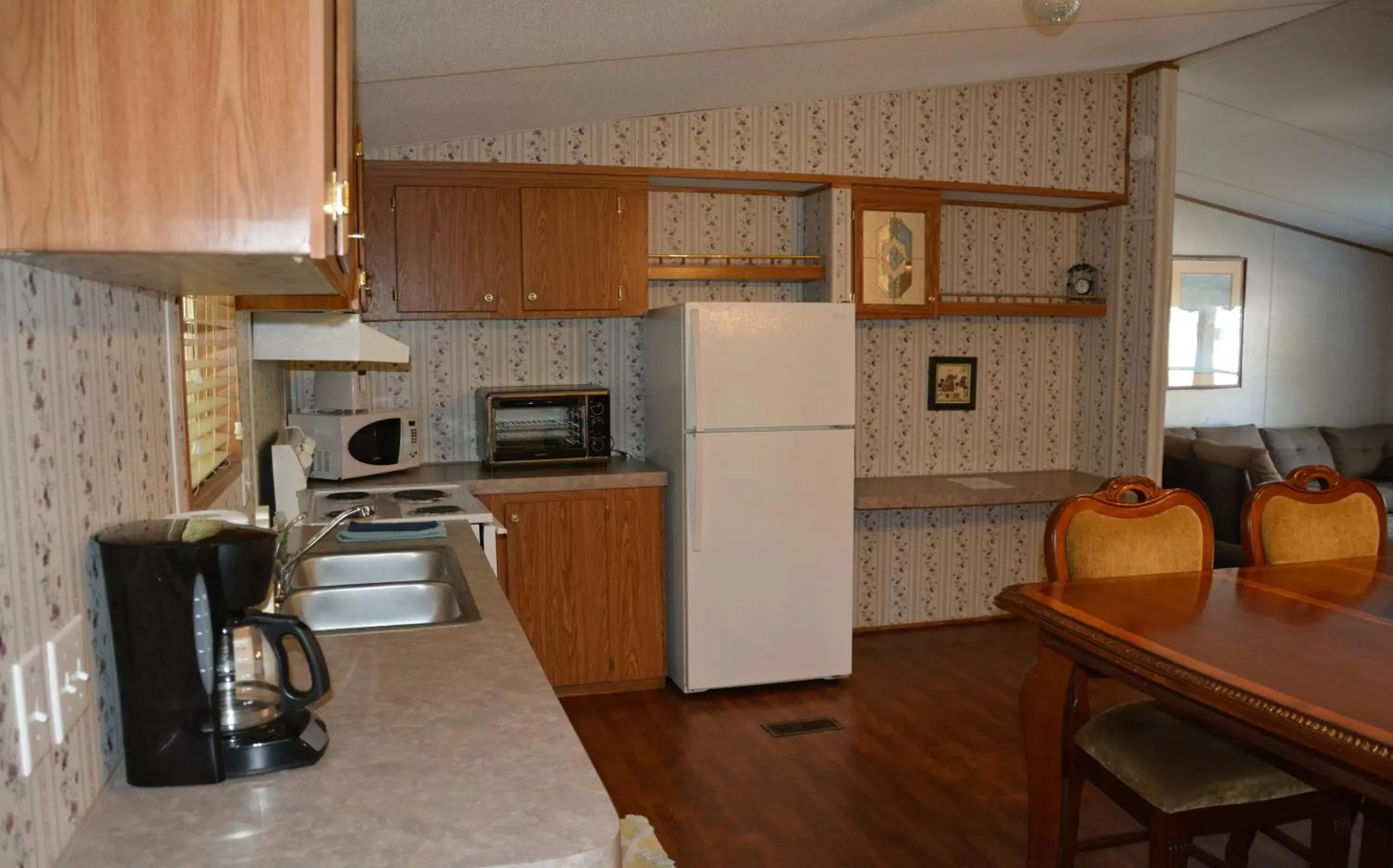 Kitchen/Kitchenette in Camp Mack, A Guy Harvey Lodge