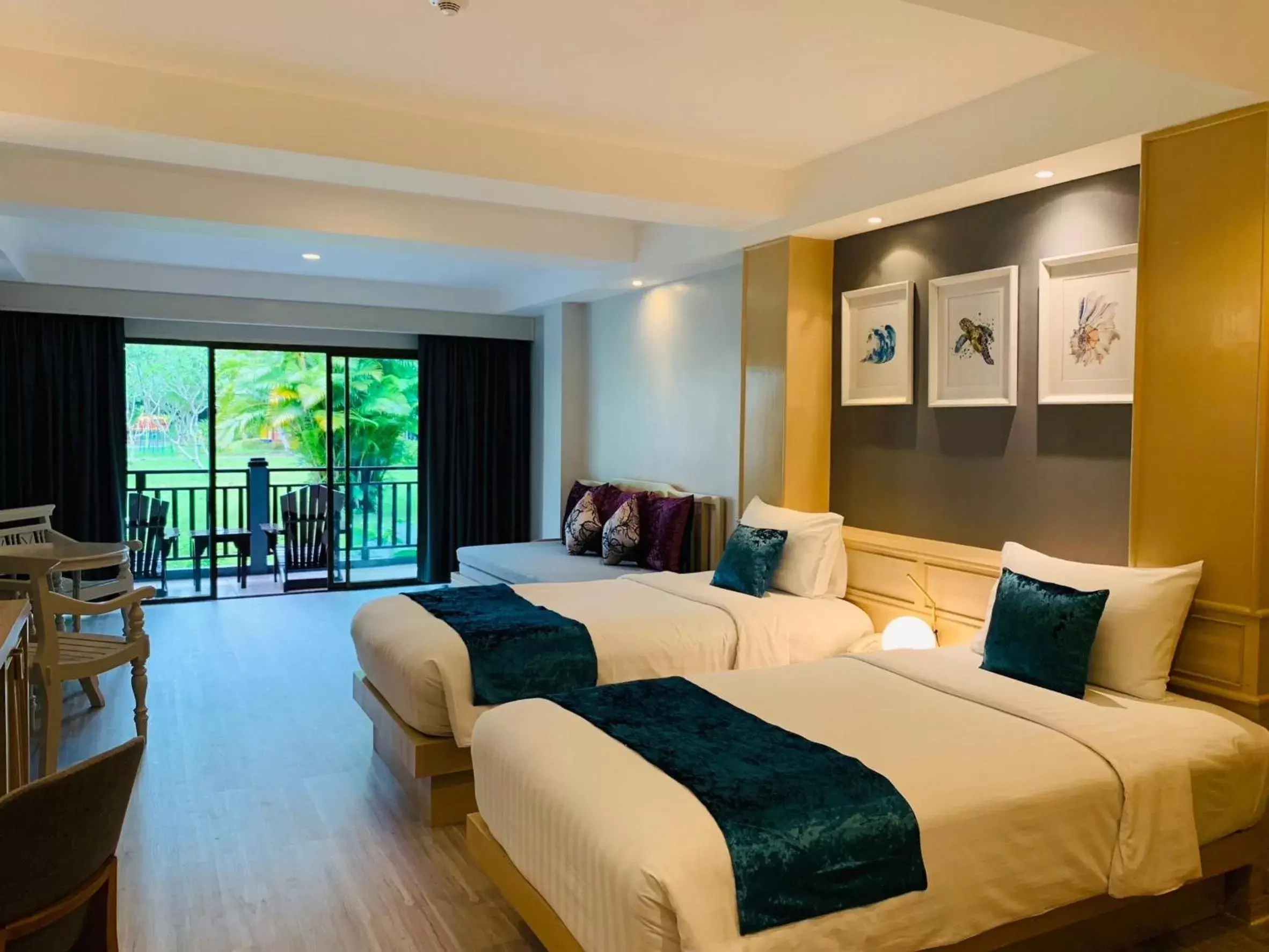 Bed in Khaolak Emerald Surf Beach Resort and Spa - SHA Extra Plus