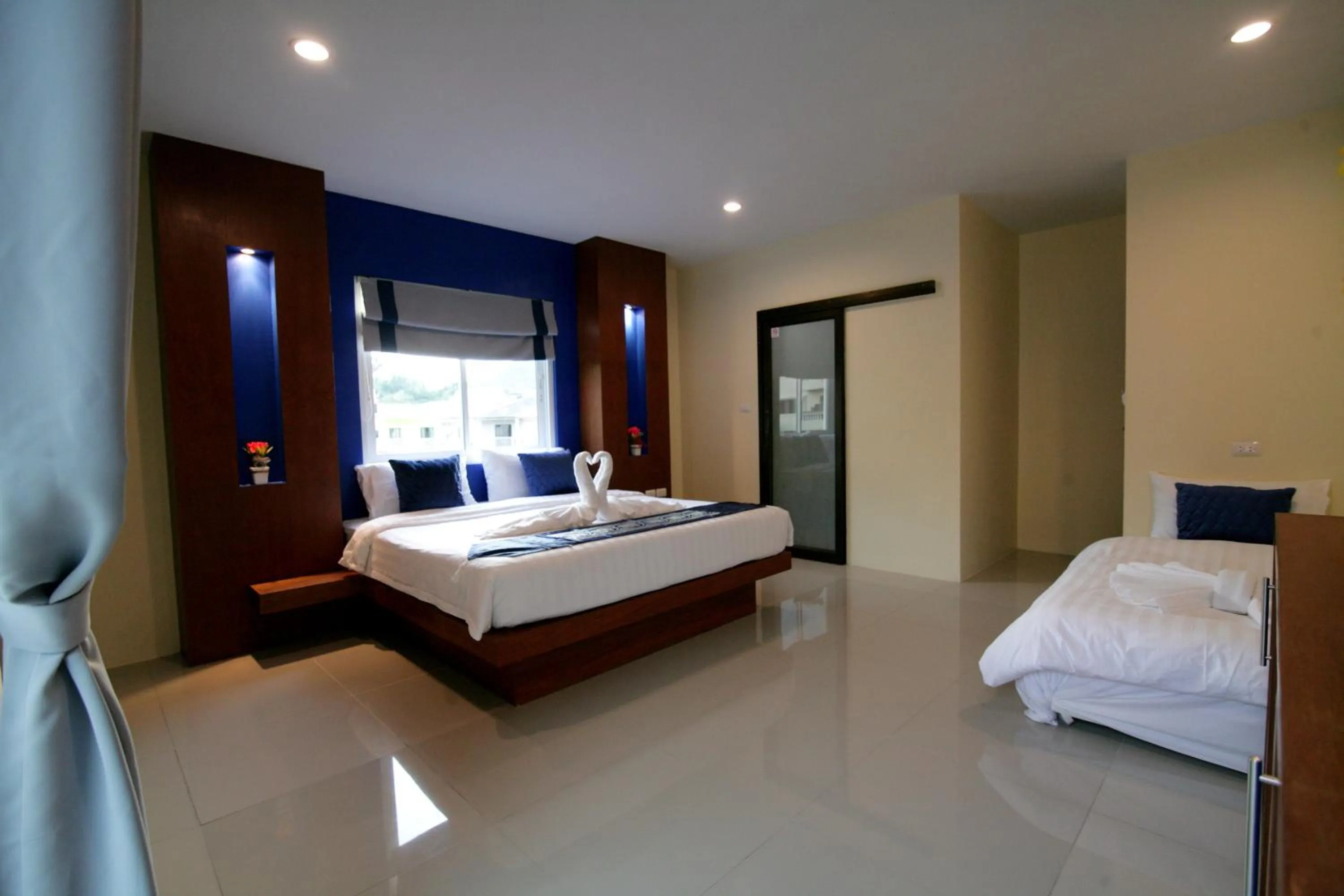 Bed in Calypso Patong Hotel
