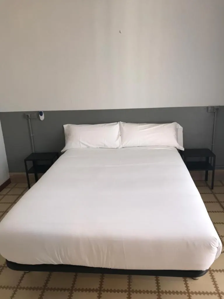 Bed in Hotel Monegal