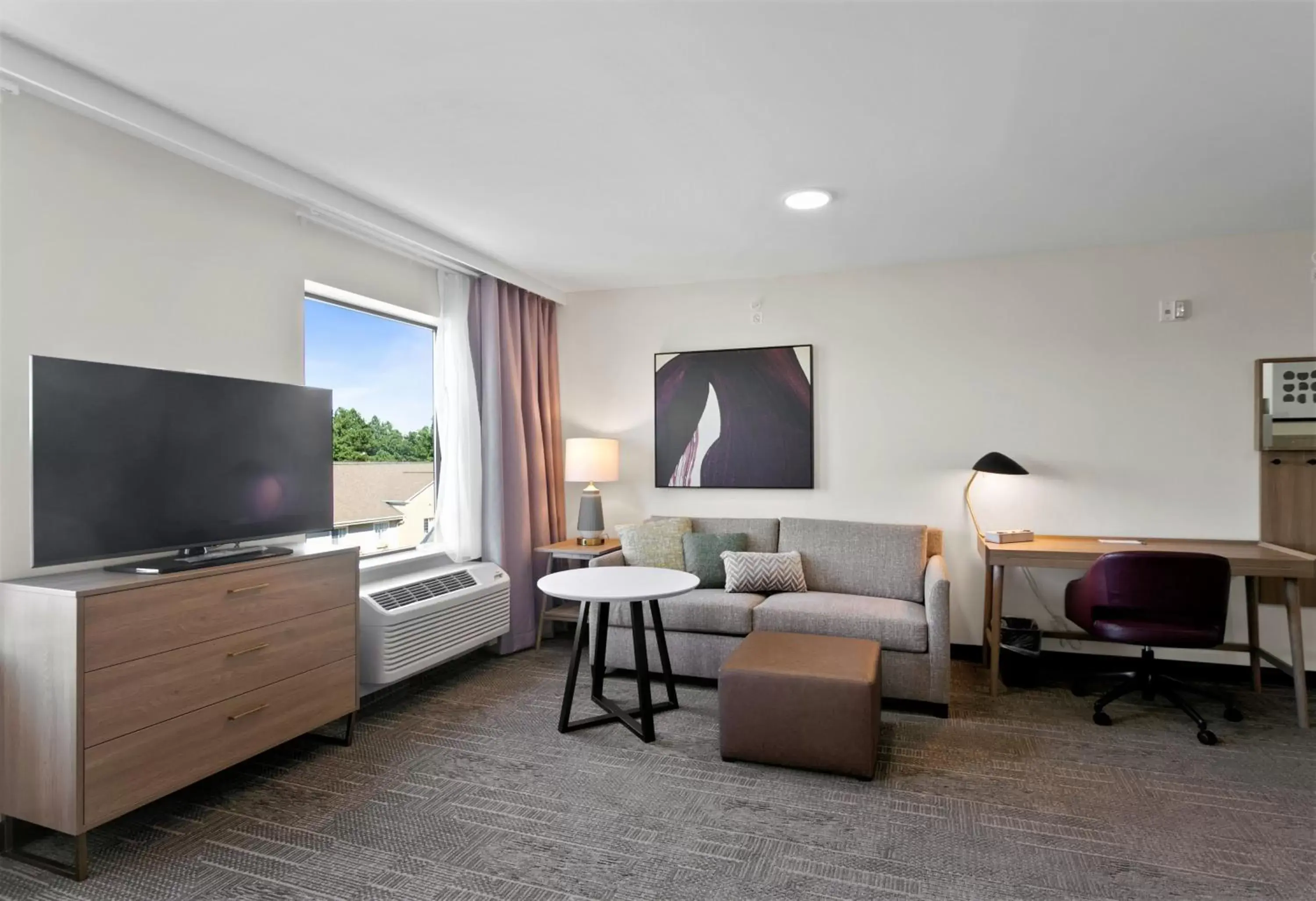 Photo of the whole room, TV/Entertainment Center in Staybridge Suites - Atlanta NE - Duluth, an IHG Hotel