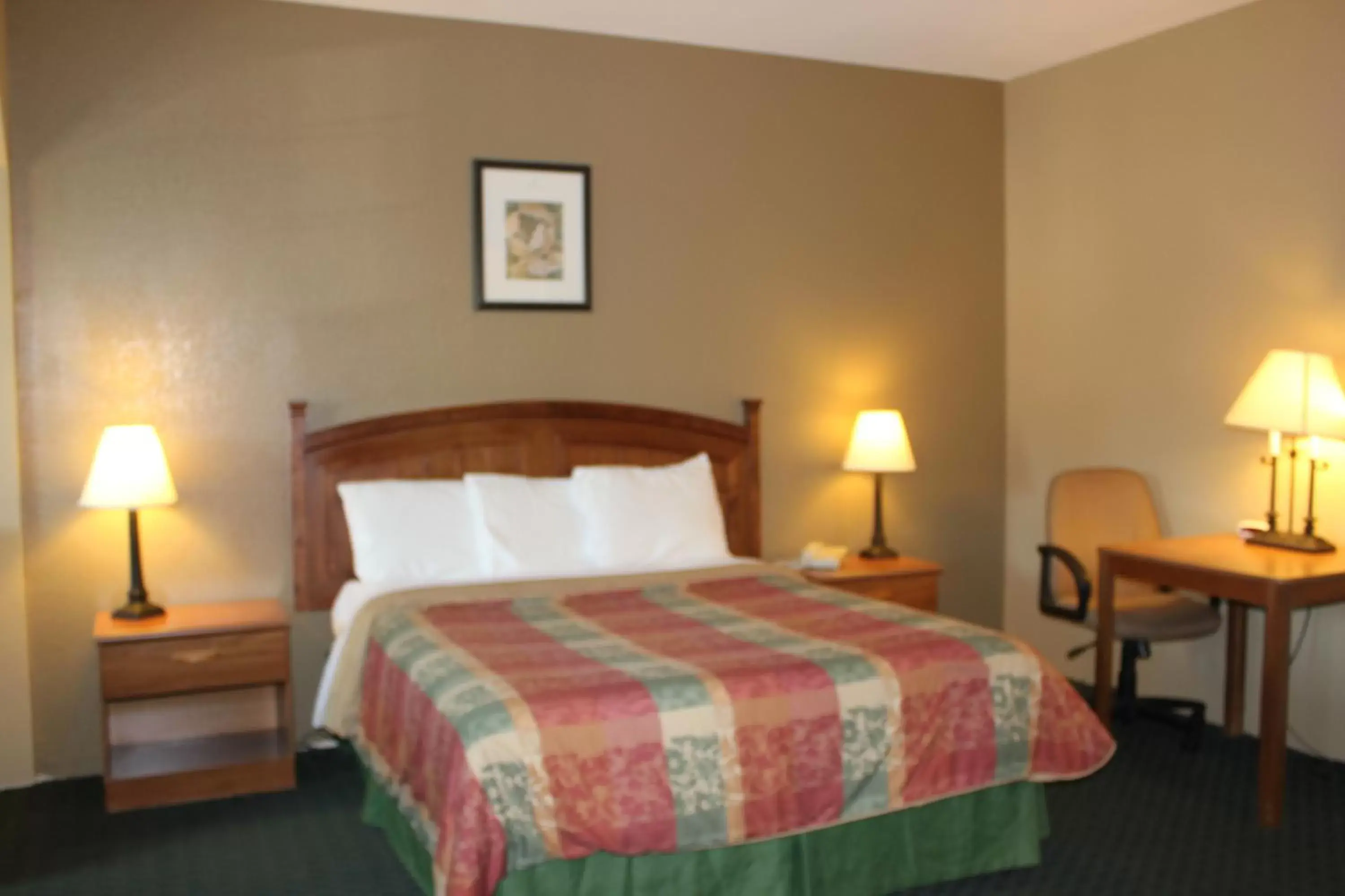 Bed in Holland Inn and Suites