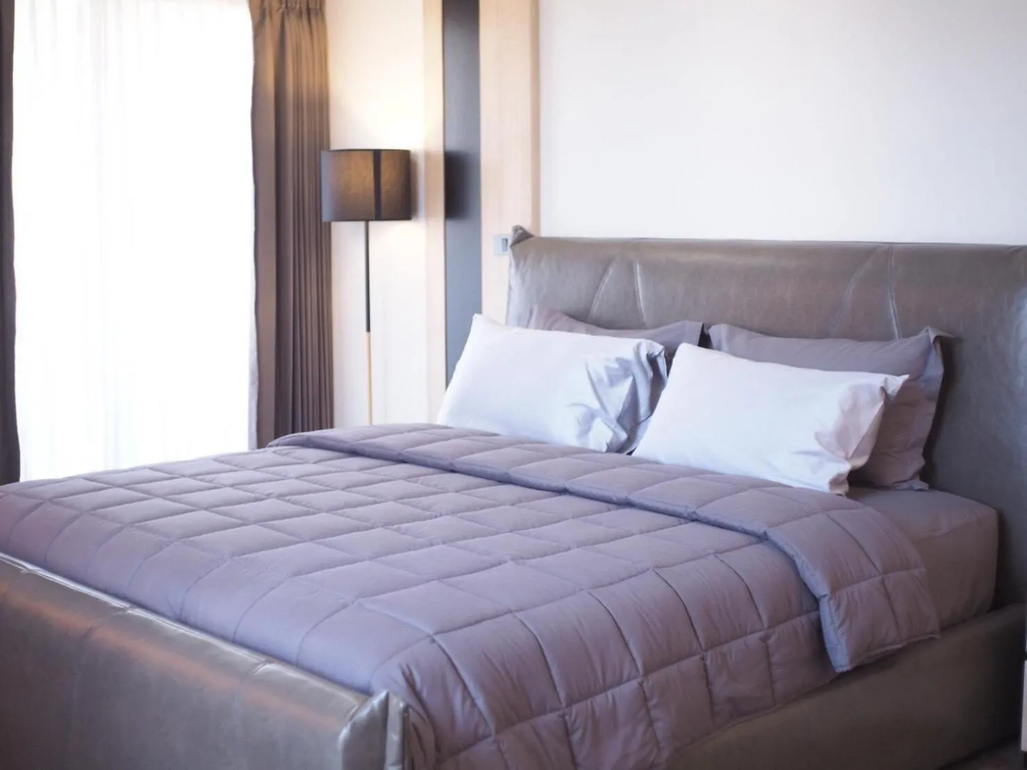 Bed in Wellness Chiang Mai Hotel