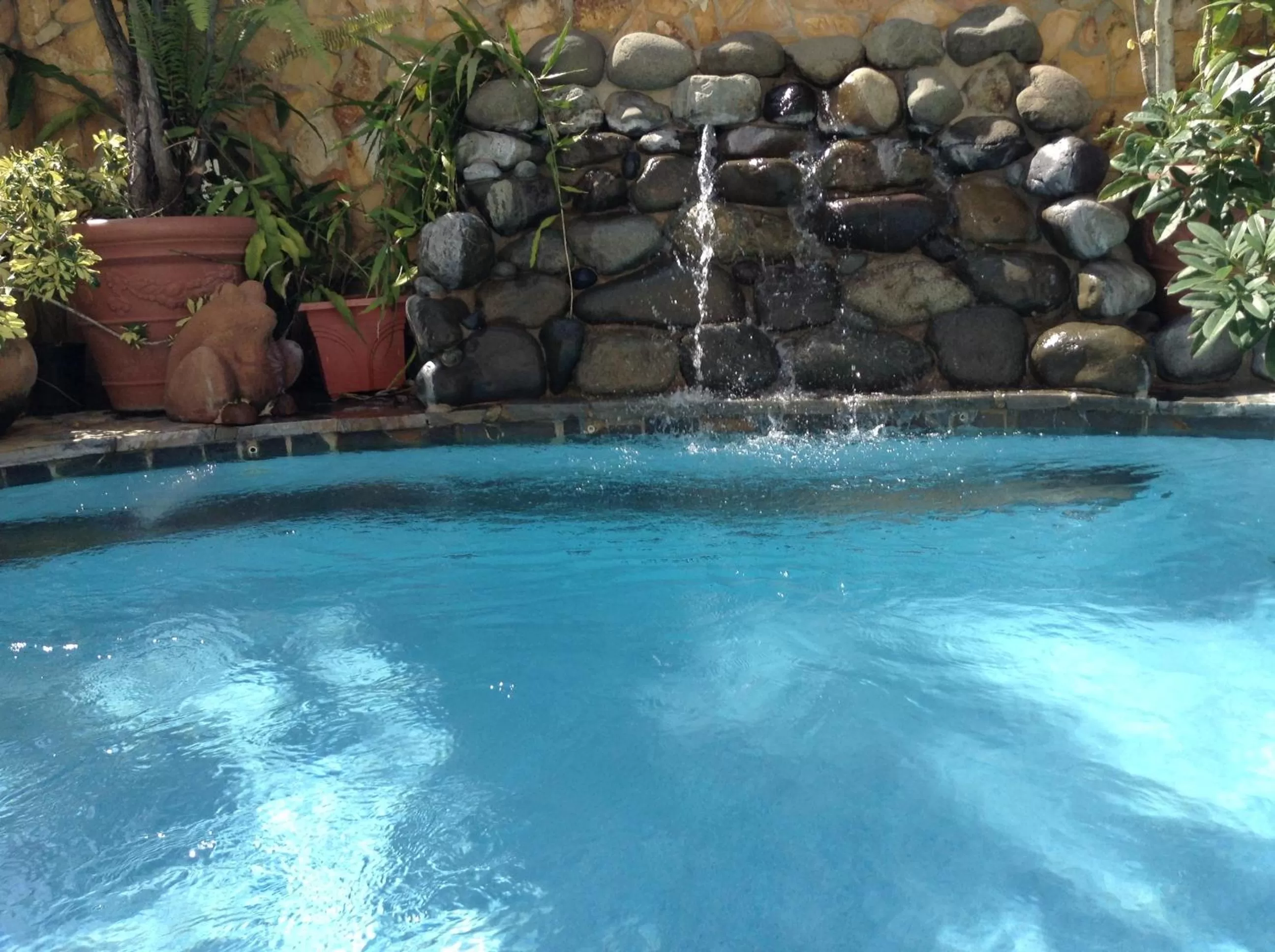 Swimming pool in At Wind Chimes Boutique Hotel
