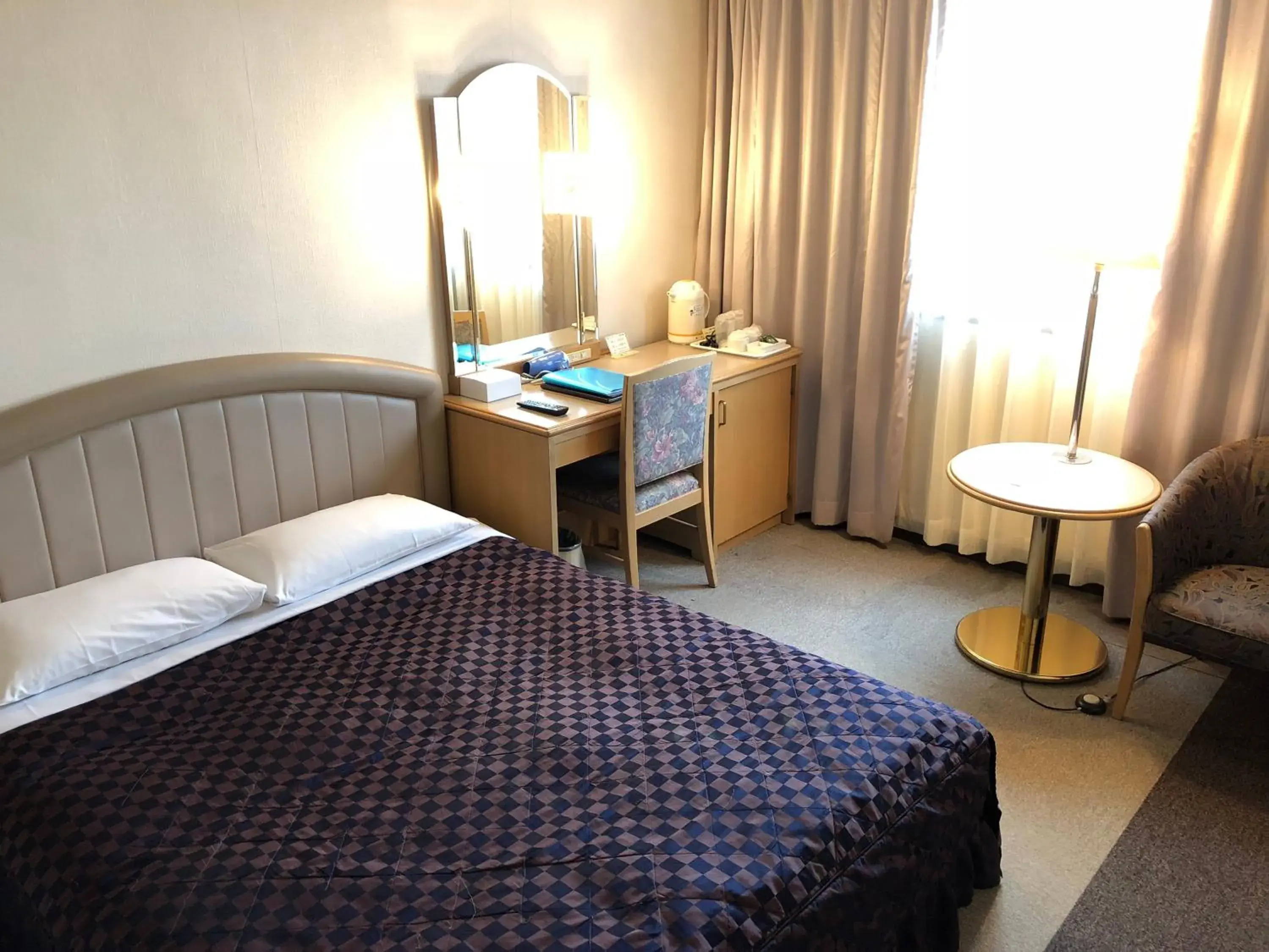 Bed in Urayasu Beaufort Hotel