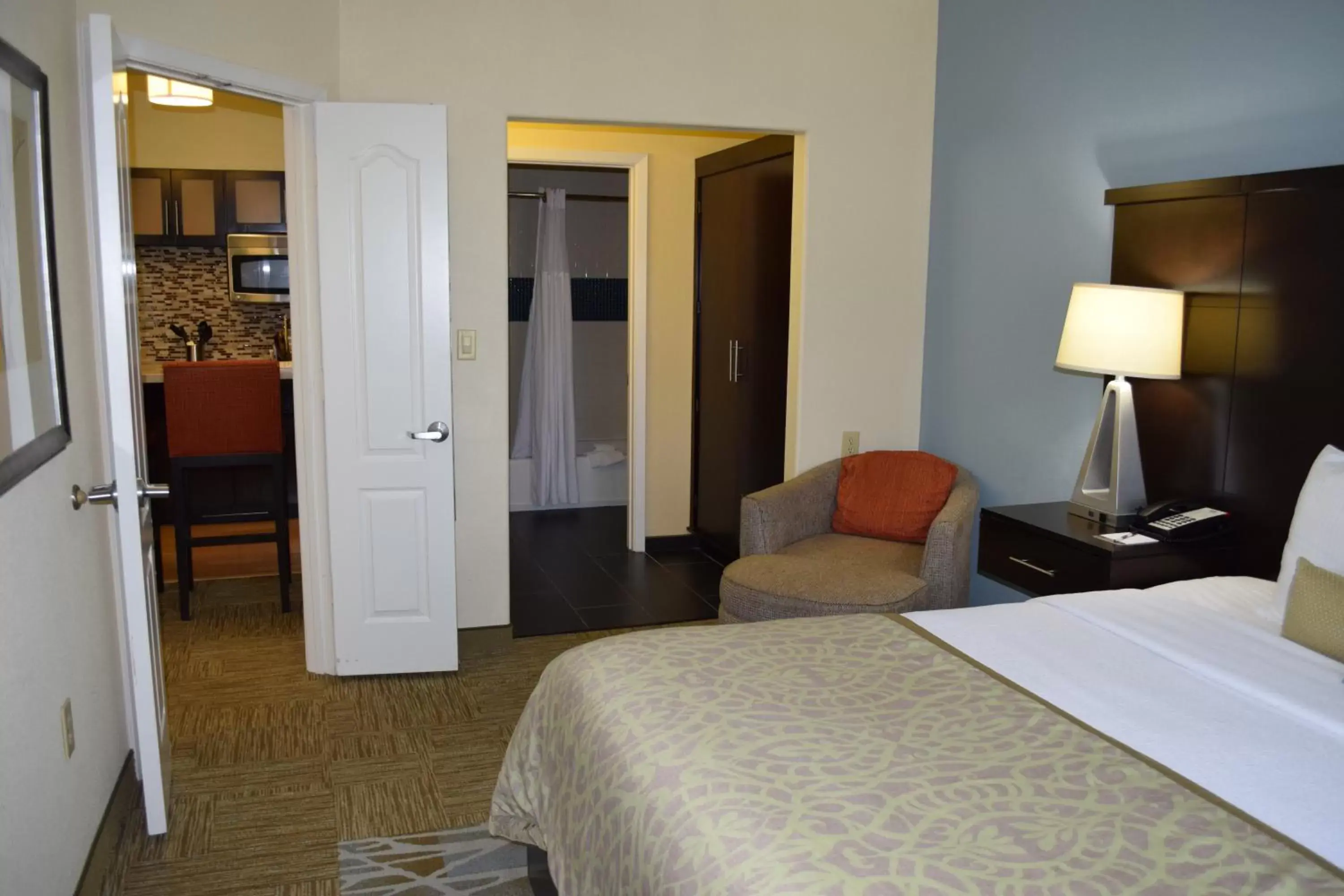 Photo of the whole room, Bed in Staybridge Suites Houston Stafford - Sugar Land, an IHG Hotel
