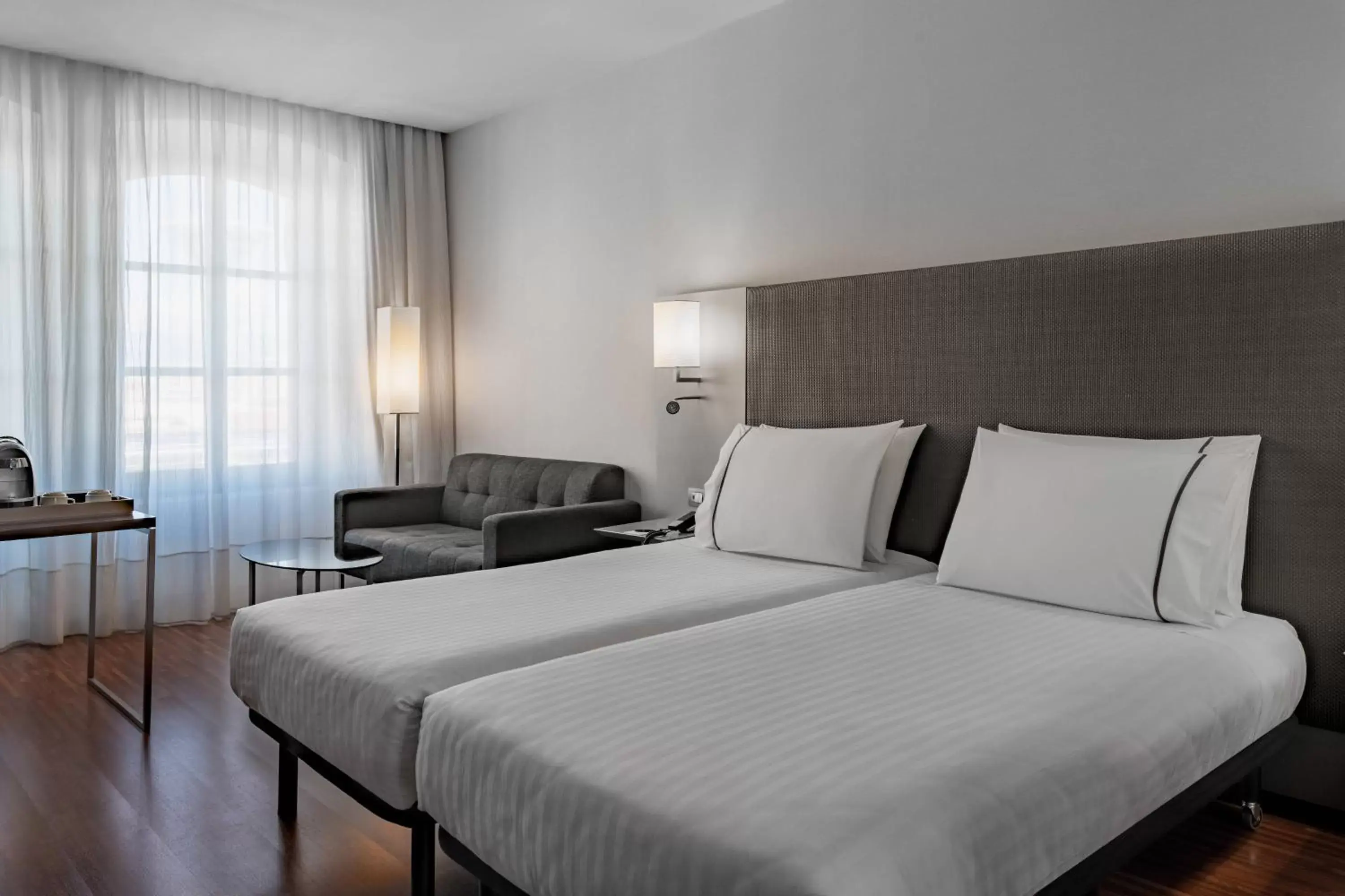 Photo of the whole room, Bed in AC Hotel Torino by Marriott