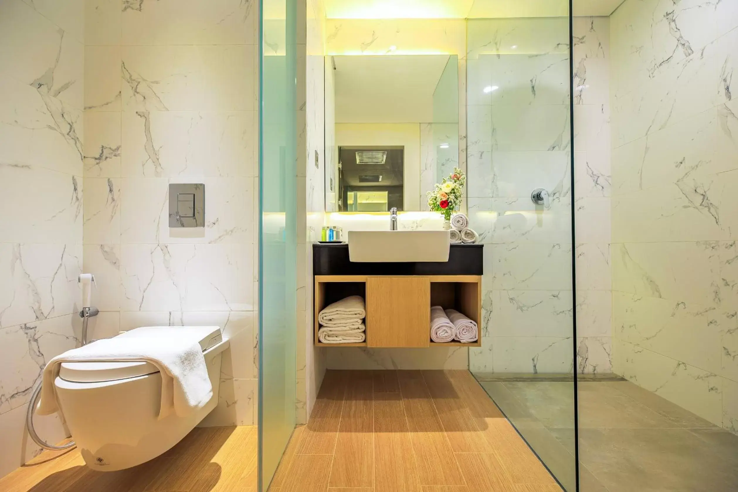 Bathroom in Aveta Hotel Malioboro - CHSE Certified