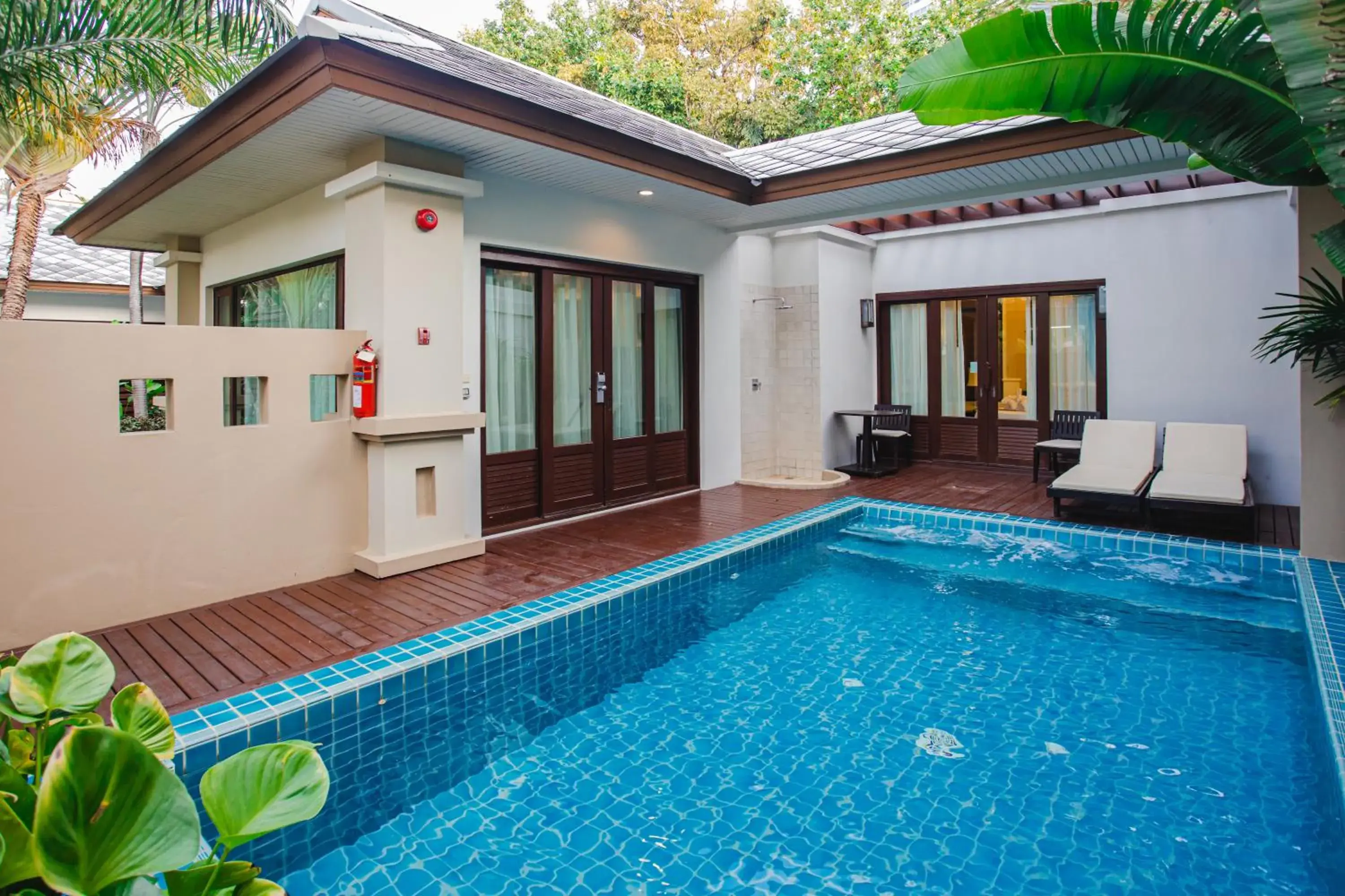 Swimming pool, Property Building in Ravindra Beach Resort & Spa - SHA Extra Plus