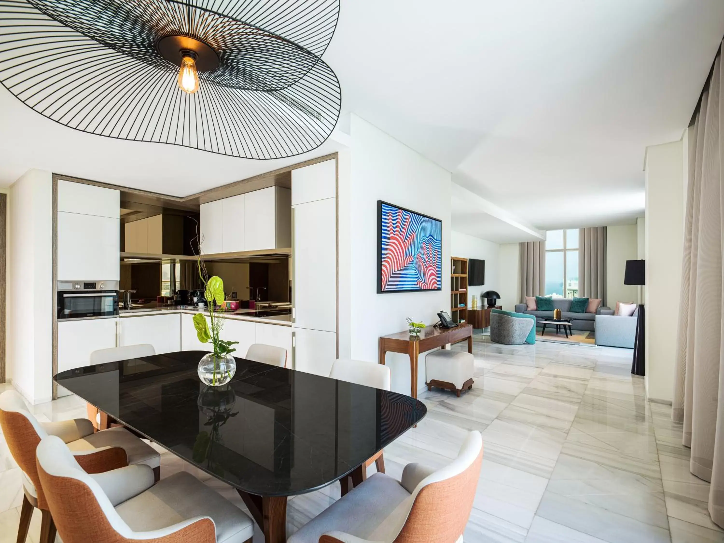 Kitchen or kitchenette, Dining Area in Th8 Palm Dubai Beach Resort Vignette Collection, an IHG hotel