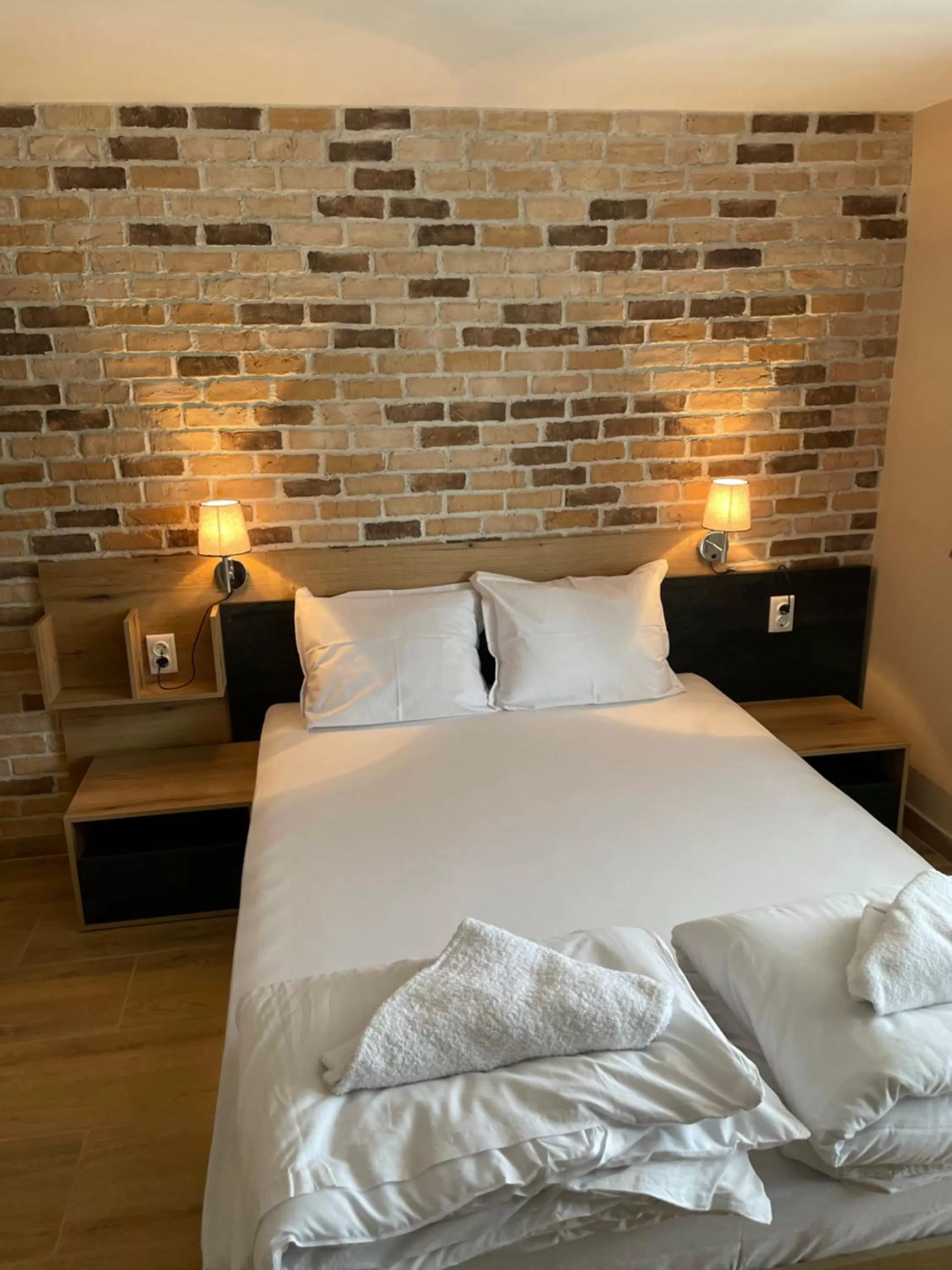 Bed in Family Hotel Malibu