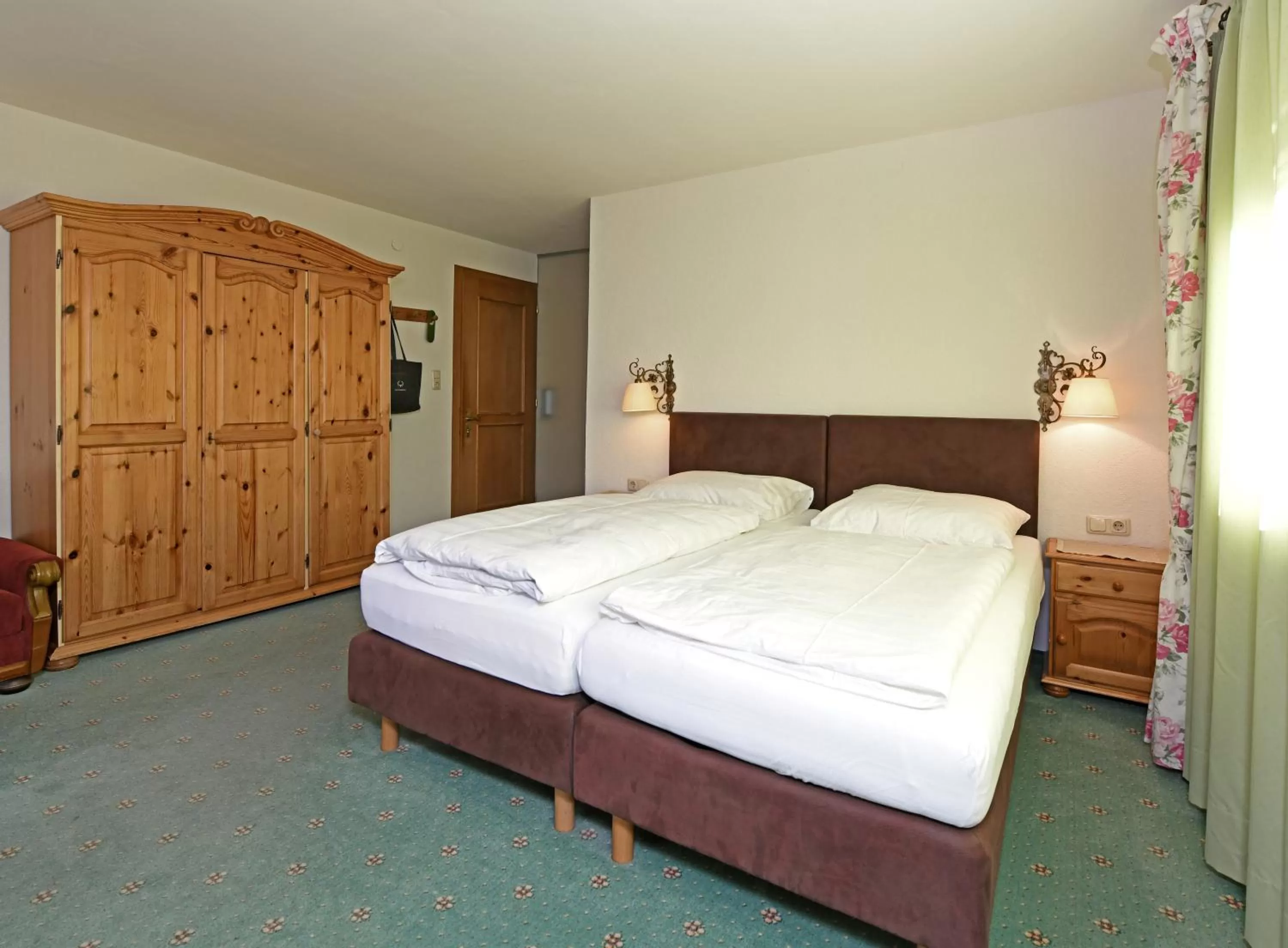 Bed in Hotel St Hubertus