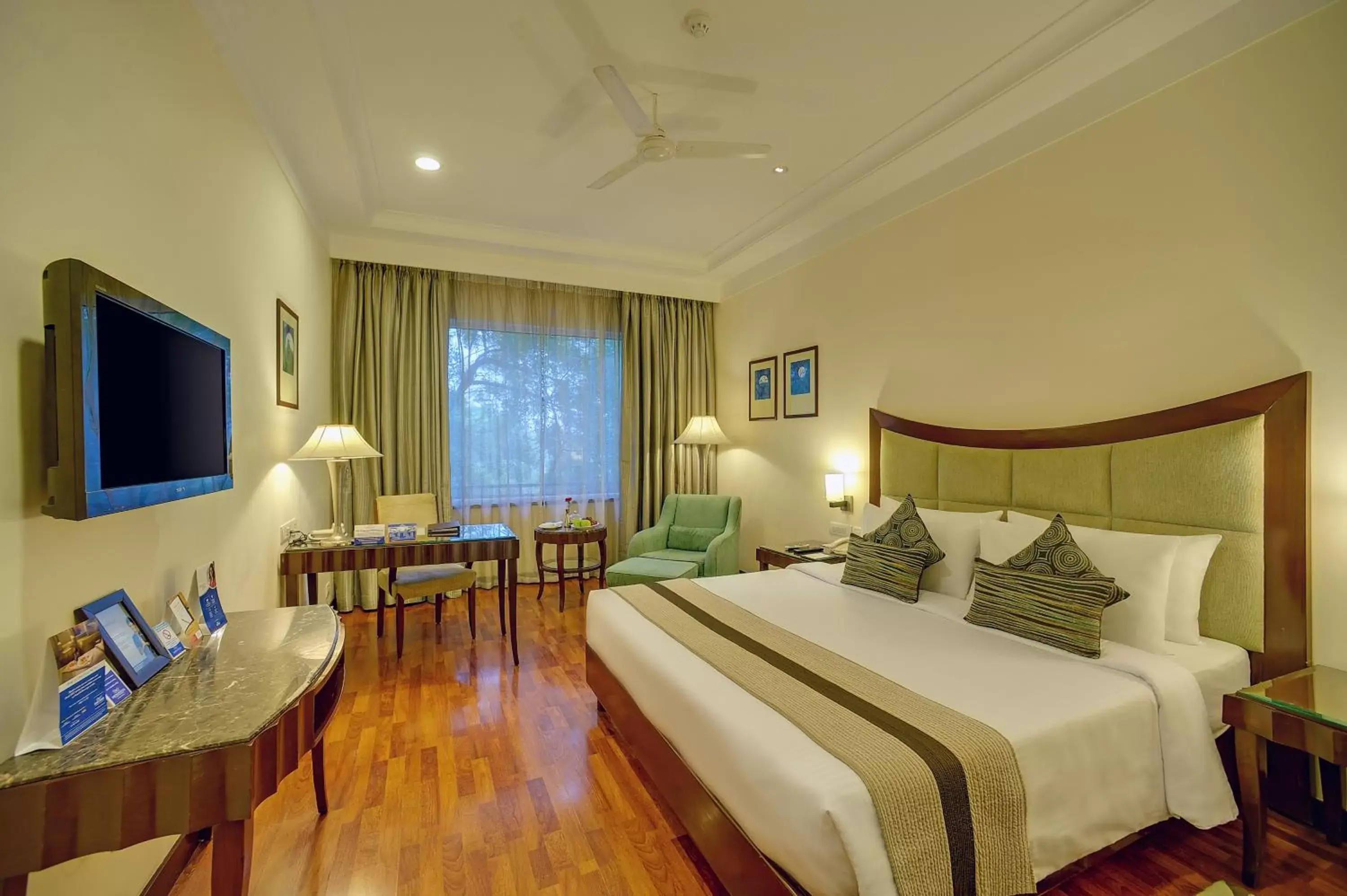 Bedroom in Muse Sarovar Portico Nehru Place