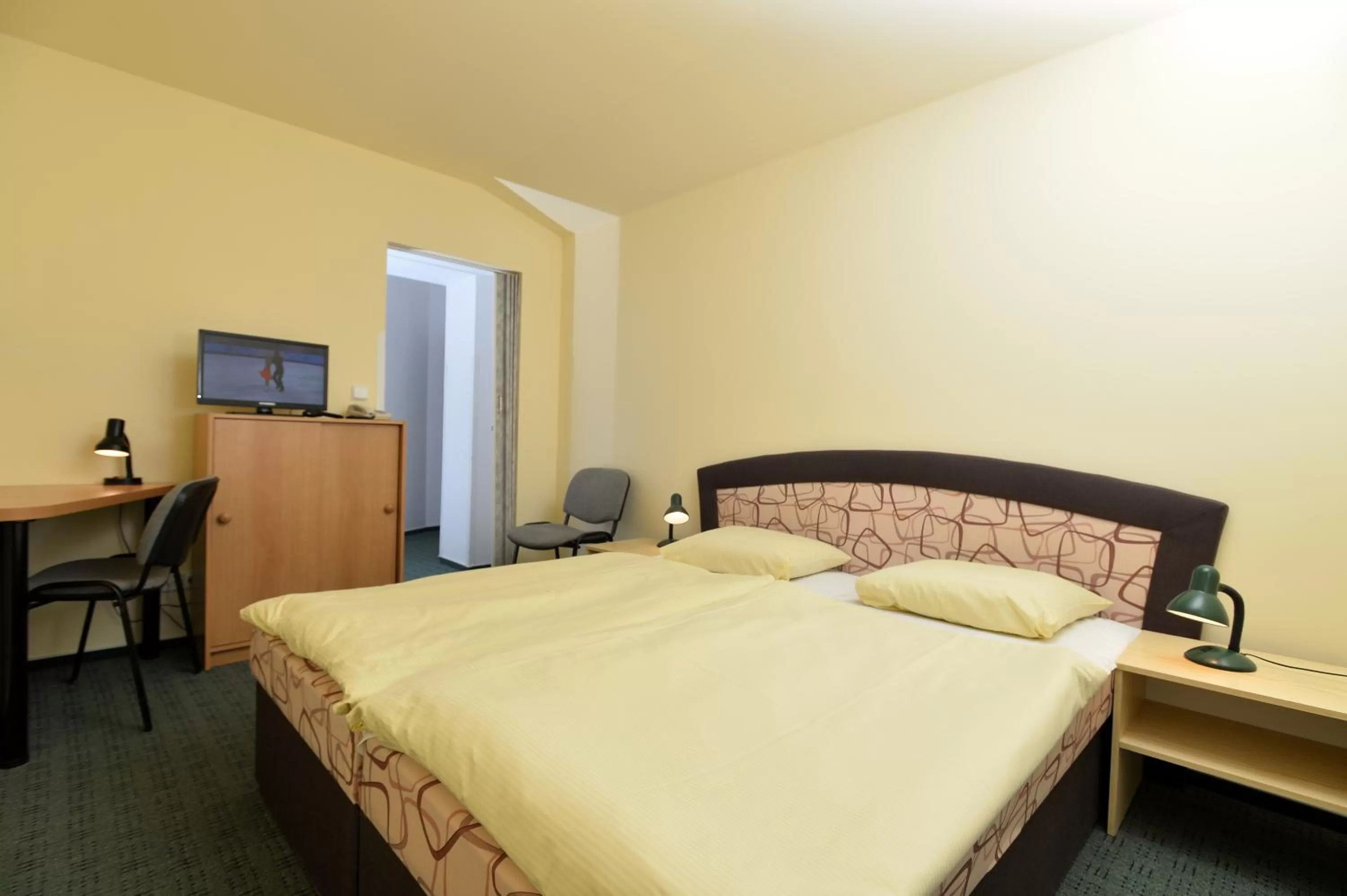 Photo of the whole room, Bed in Hotel U Jezírka