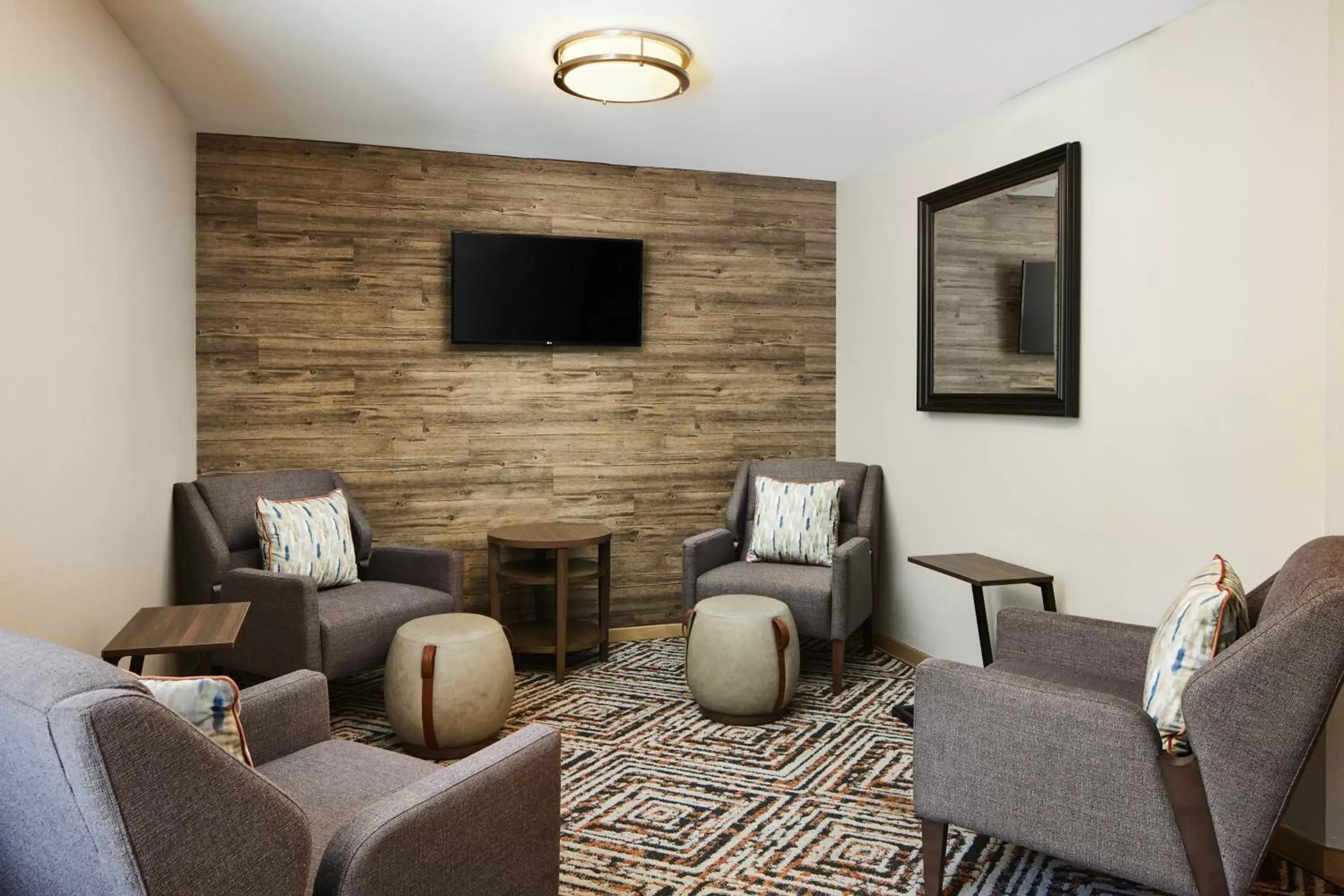 Lobby or reception, Seating Area in Candlewood Suites I-26 @ Northwoods Mall, an IHG Hotel