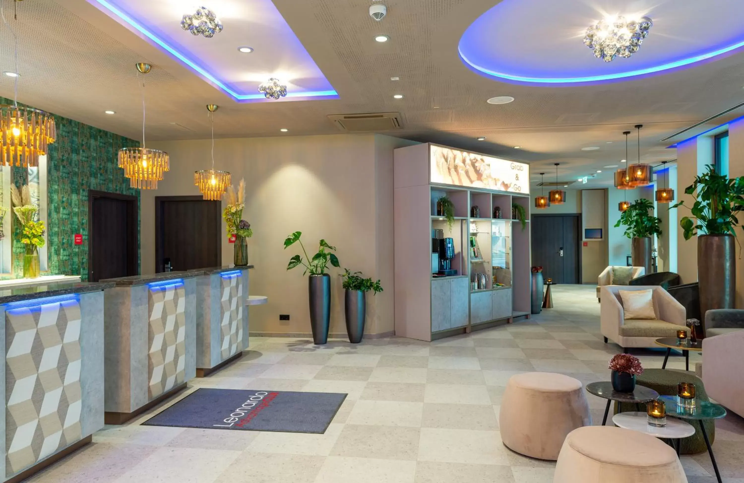 Lobby or reception in Leonardo Hotel Augsburg Lobby or reception in Leonardo Hotel Augsburg
