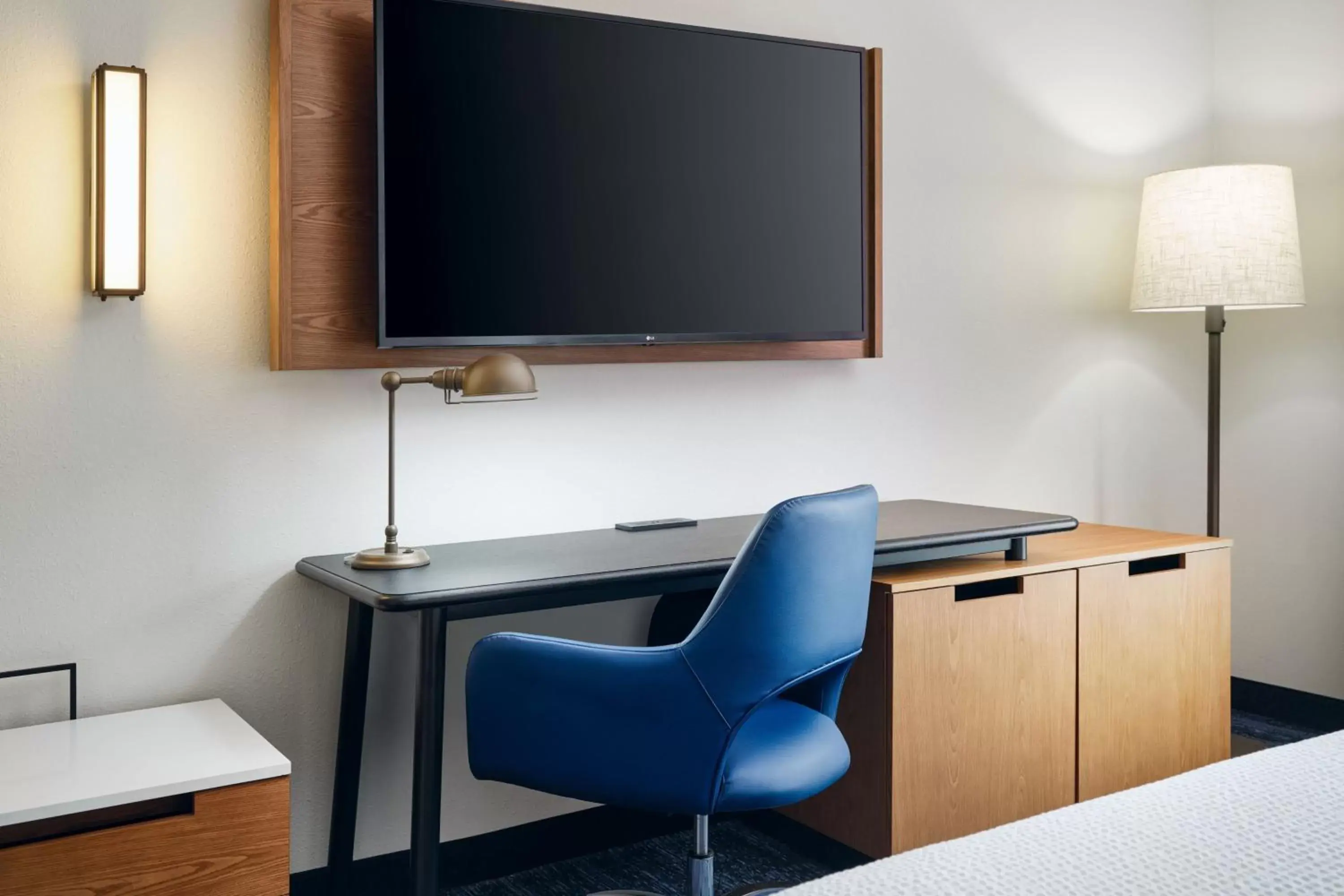 Photo of the whole room, TV/Entertainment Center in Fairfield Inn & Suites Auburn Opelika