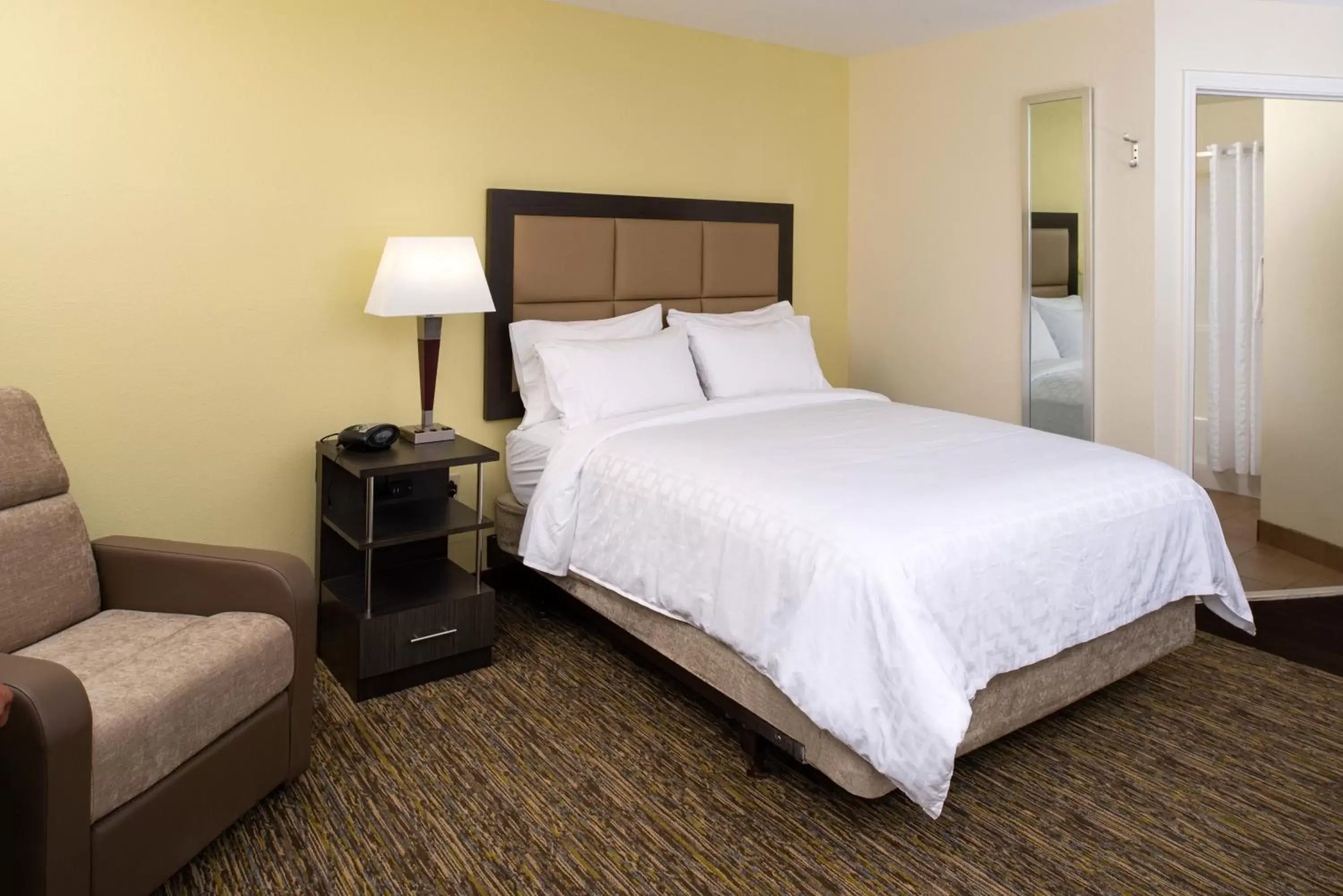 Photo of the whole room, Bed in Candlewood Suites Olathe, an IHG Hotel