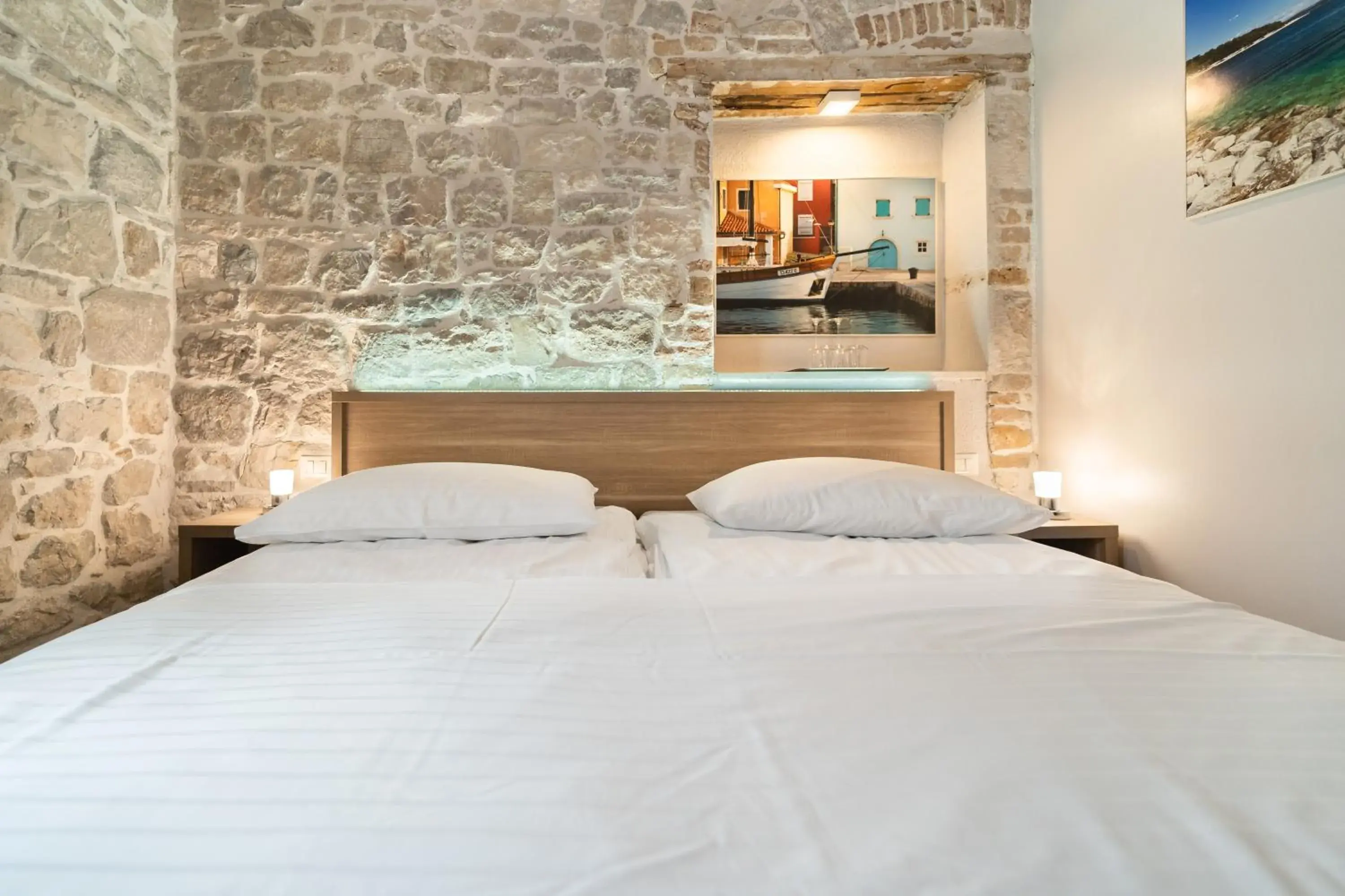 Bed in Tifani Luxury Rooms