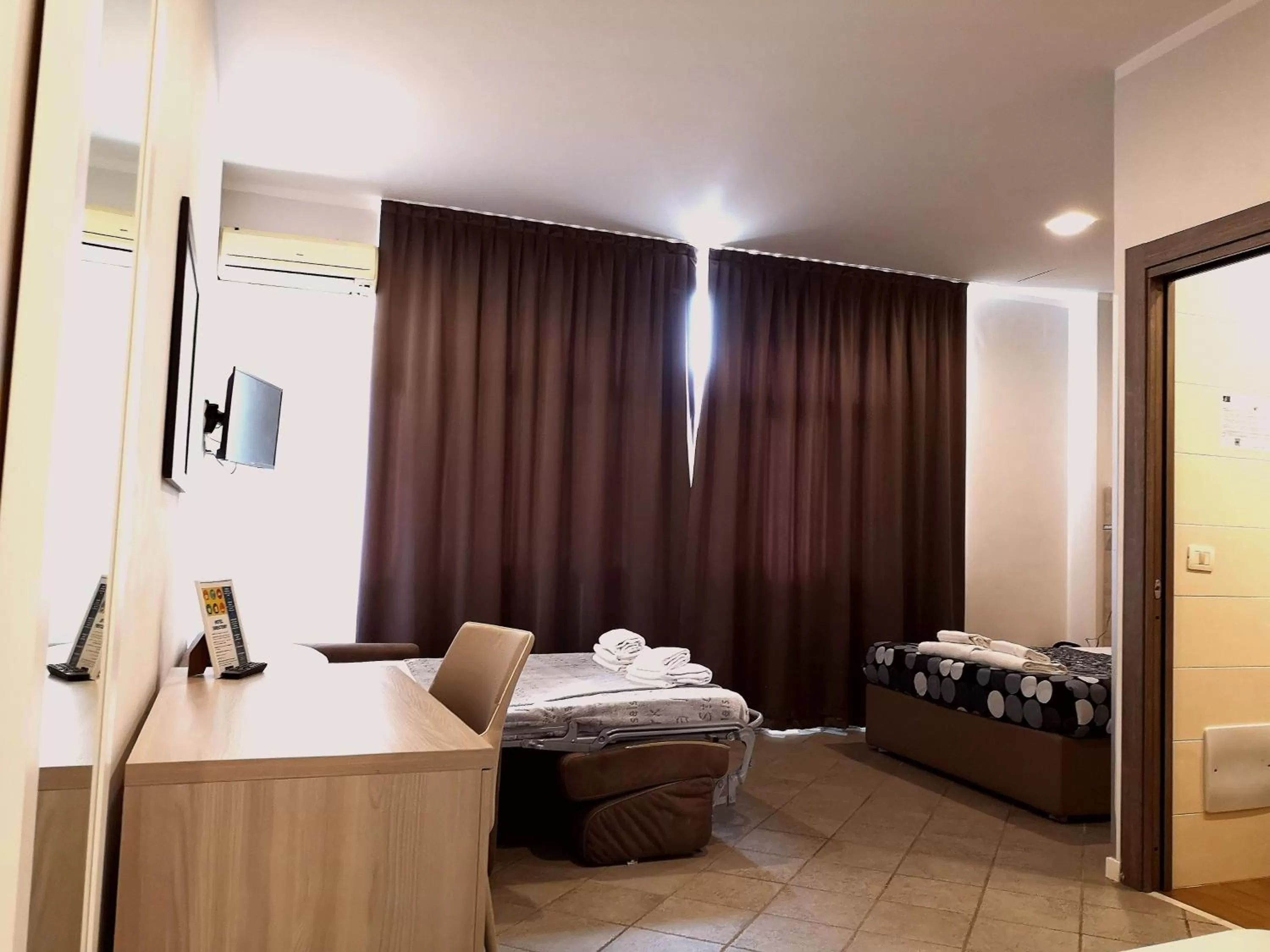 Bed in Academy Hotel