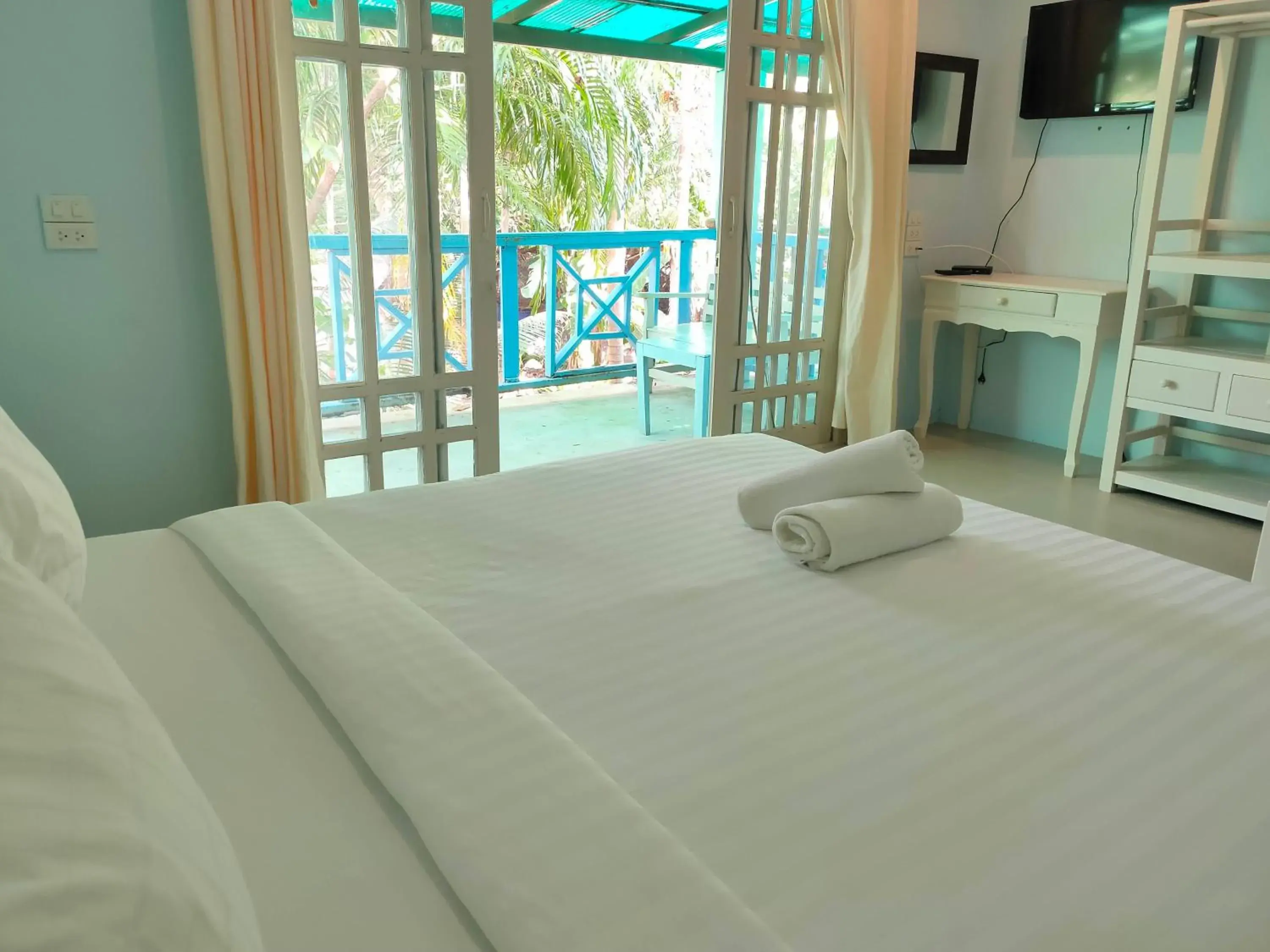 Bed in Banana Beach Resort