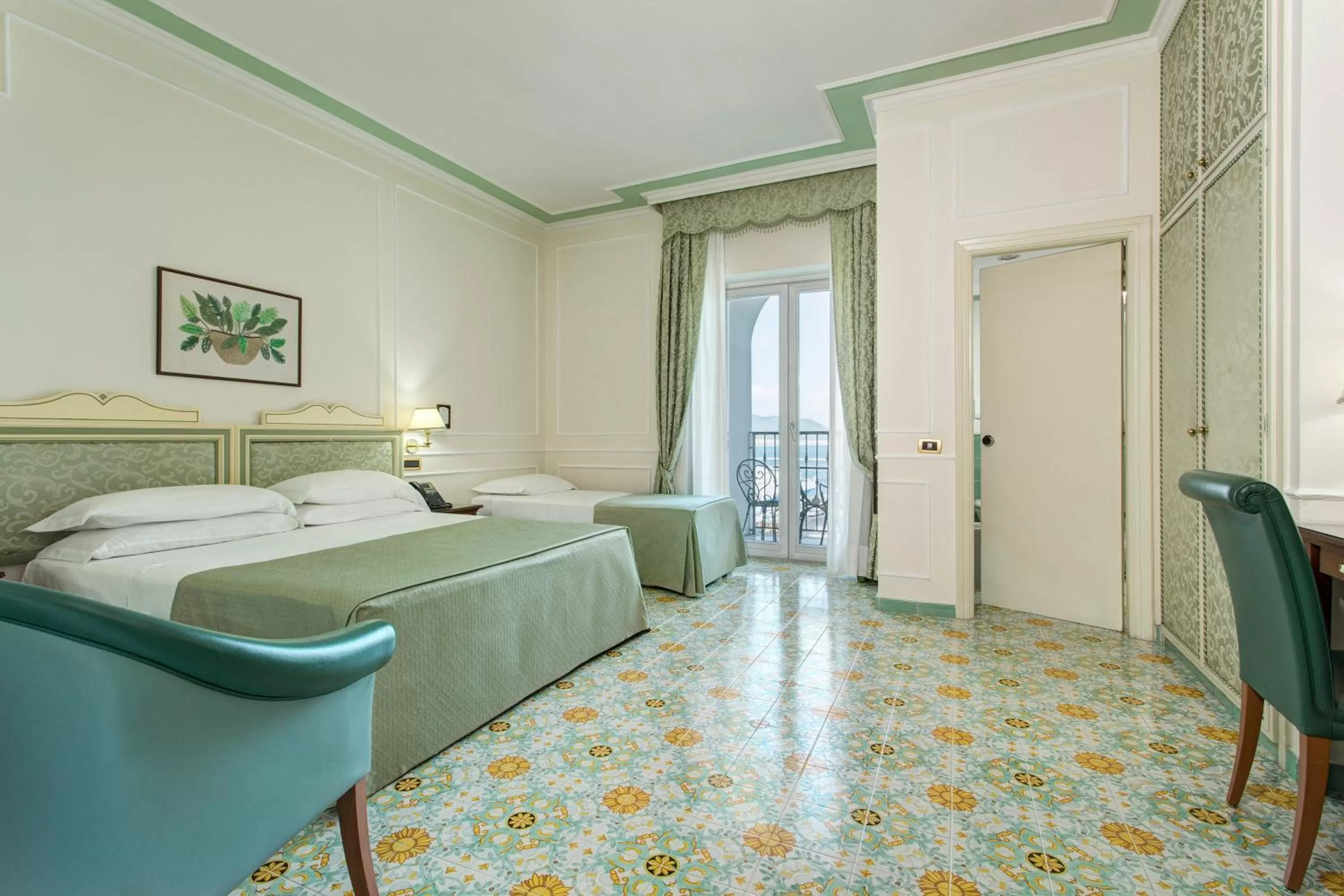 Bed in Lloyd's Baia Hotel