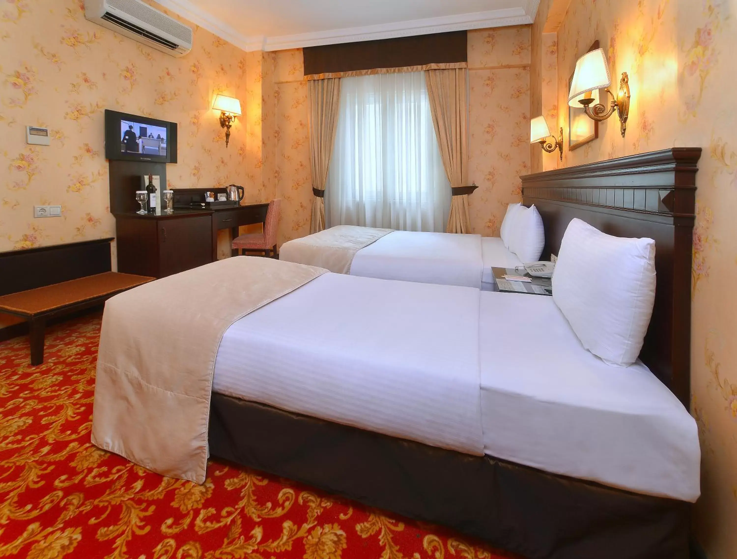 Bed in Pera Rose Hotel