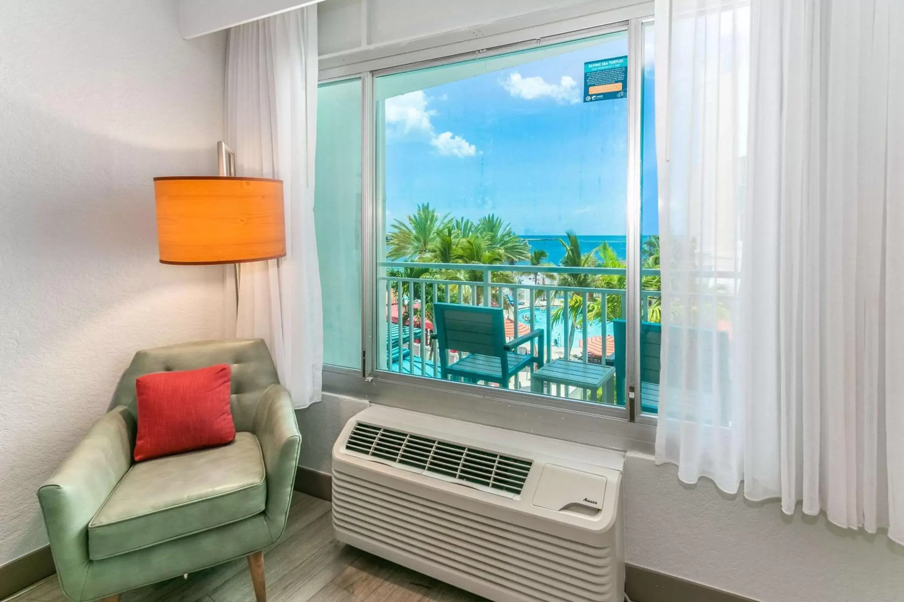 Seating area, TV/Entertainment Center in Winter the Dolphins Beach Club, Ascend Hotel Collection