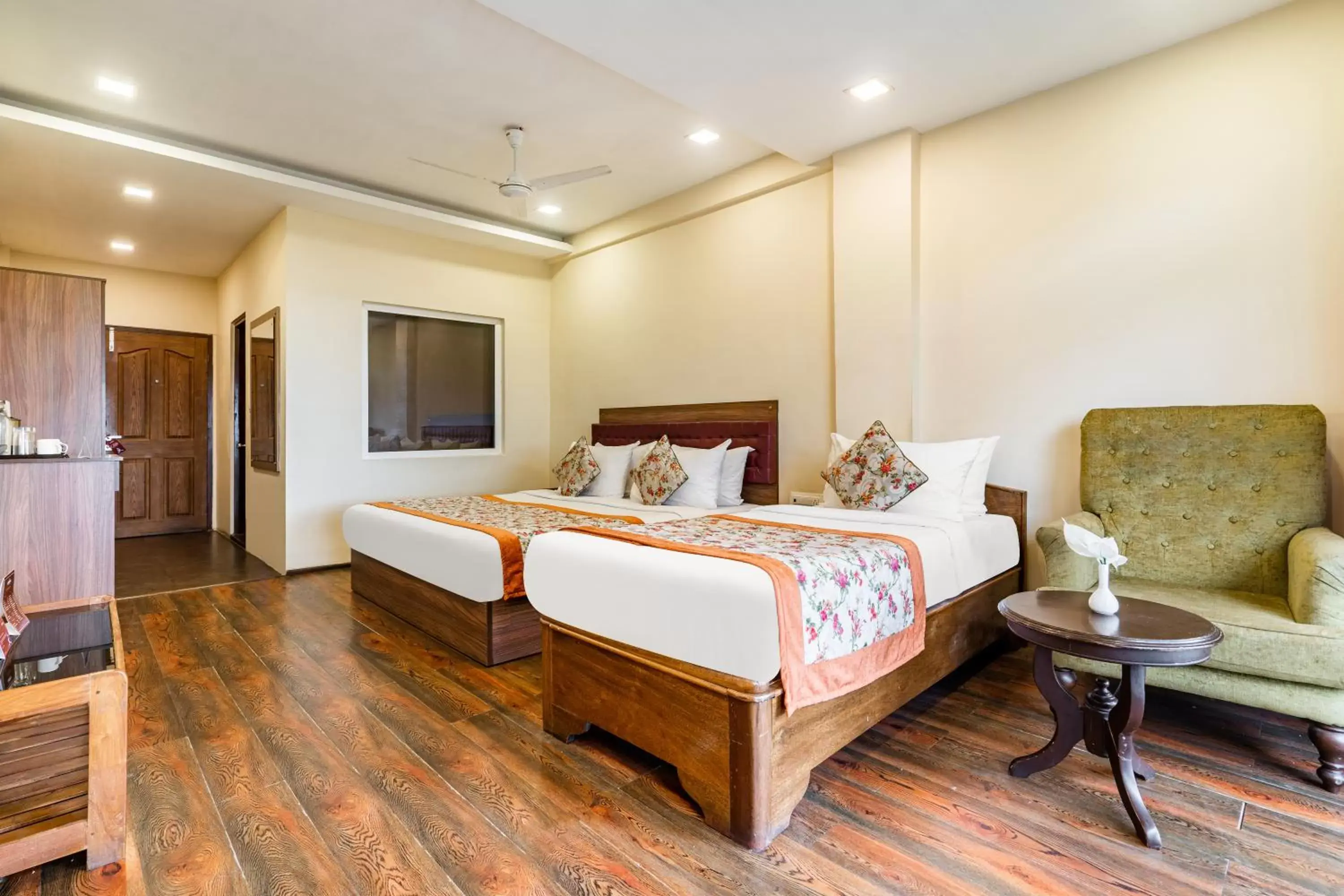 Bed in Summit Barsana Resort & Spa