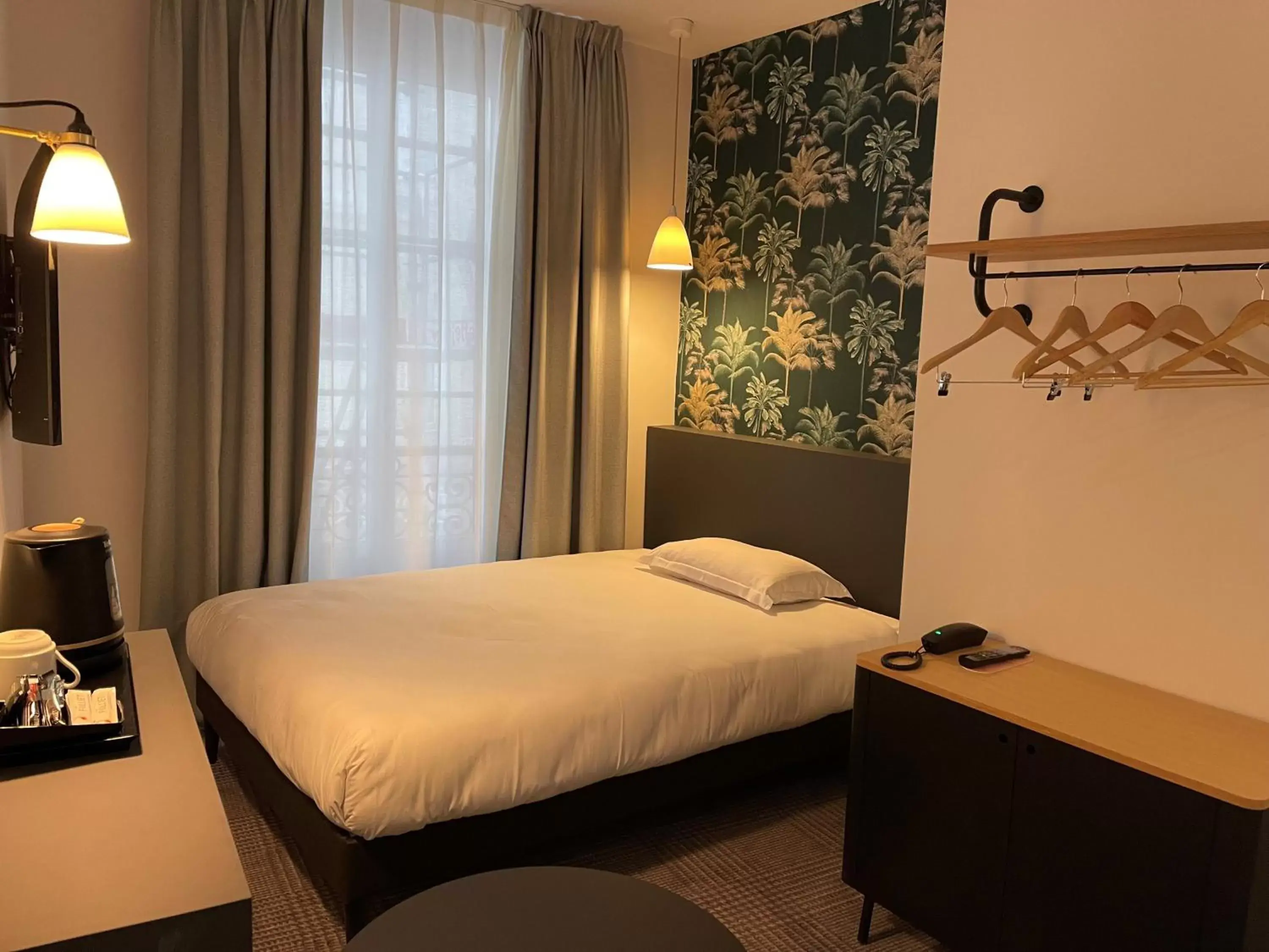 Bed in Hotel De Suez