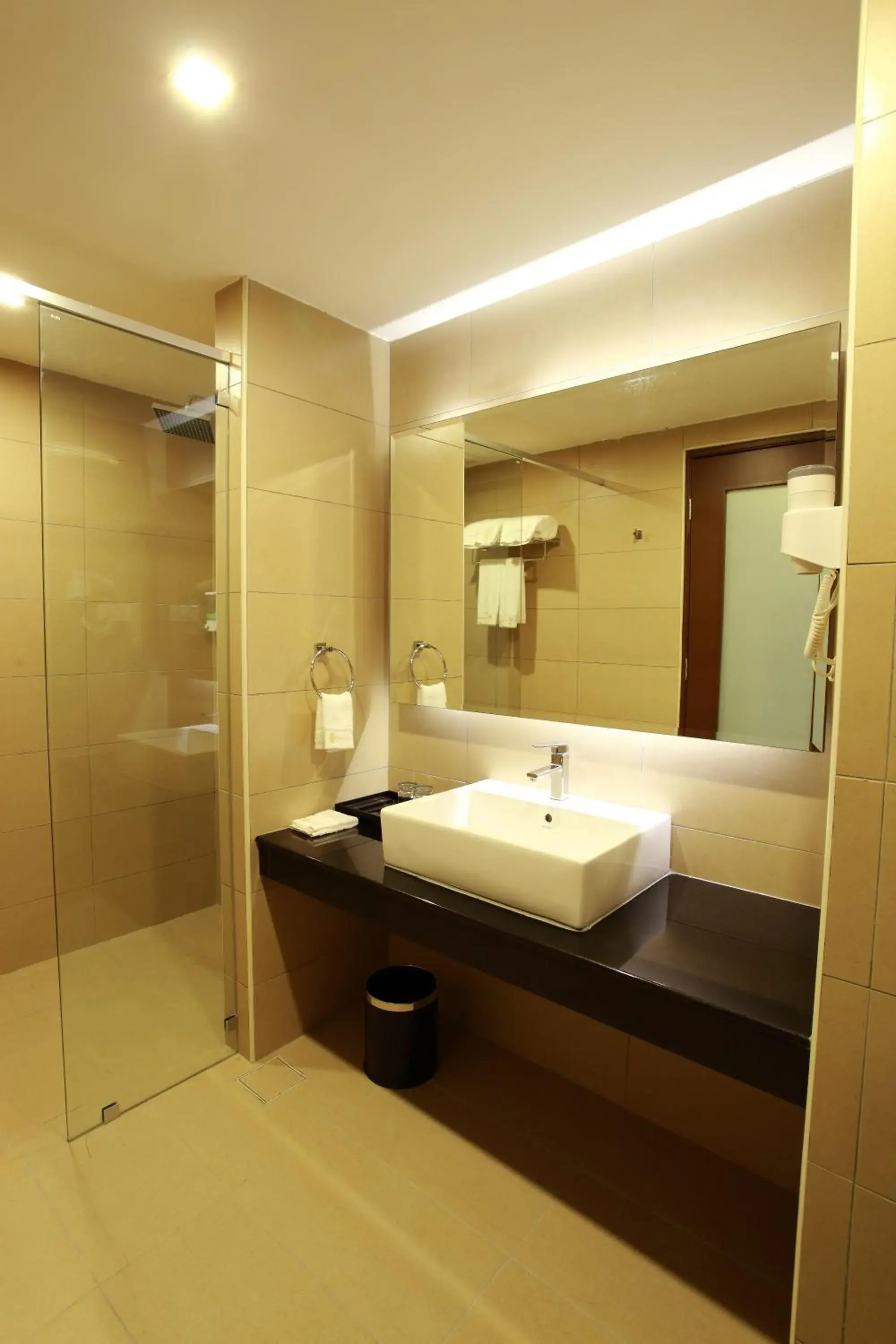 Bathroom in Symphony Suites Hotel