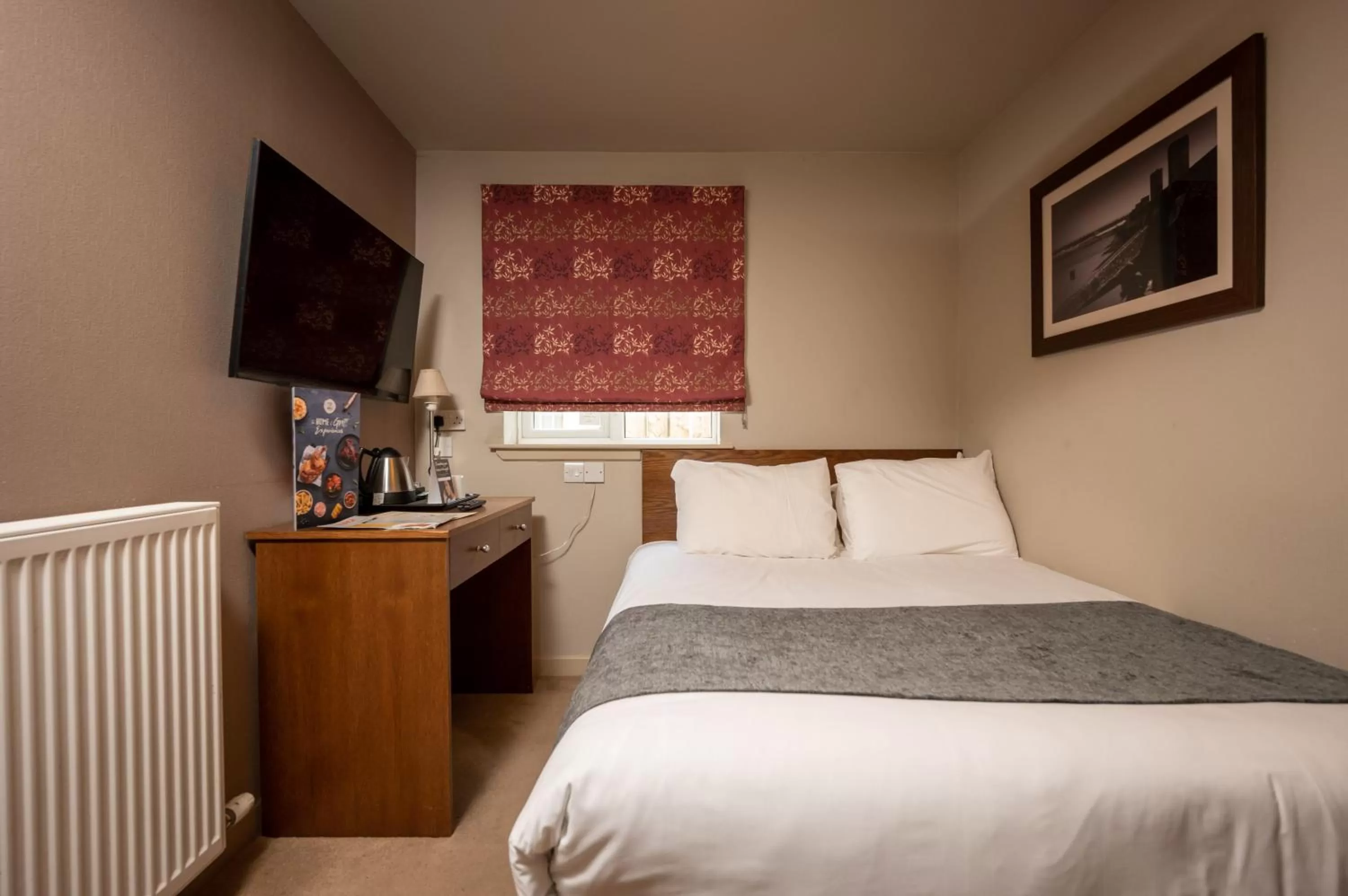 Bed in Wellington Hotel by Greene King Inns